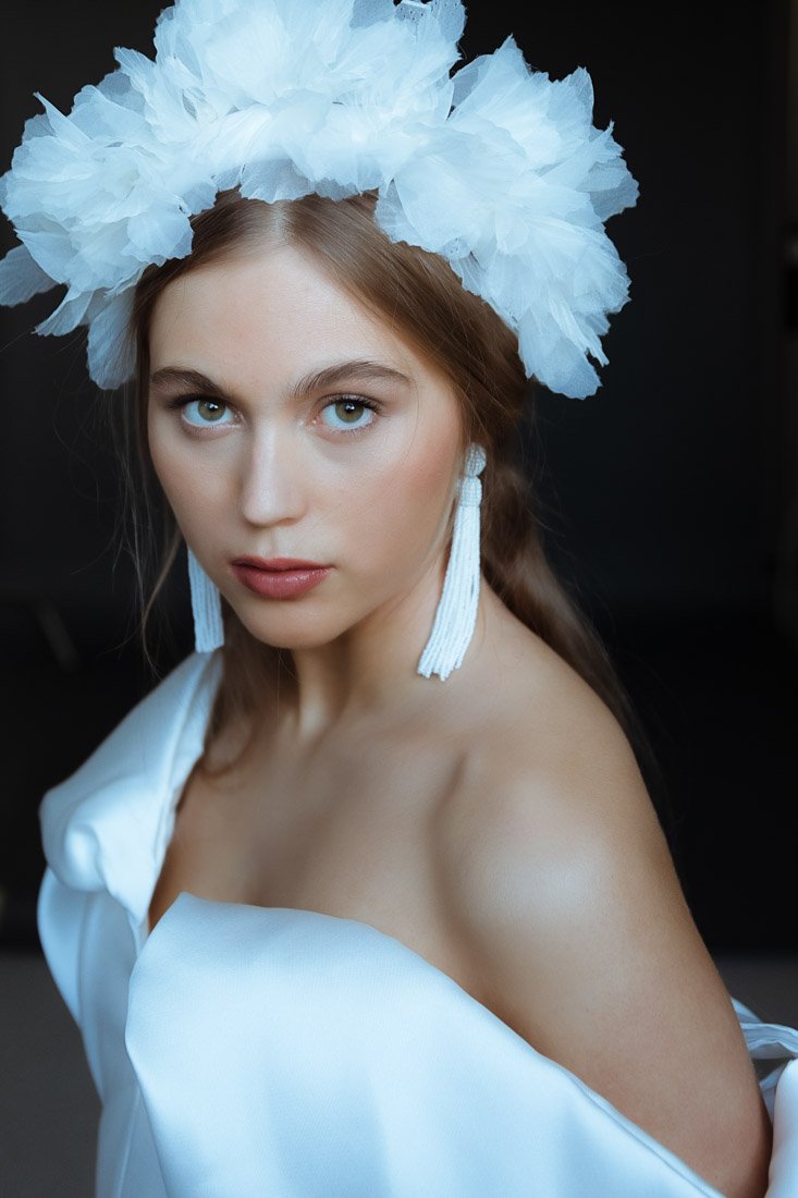 Dreamy full length bridal dress photography London, romantic wedding gown on model with soft studio lighting