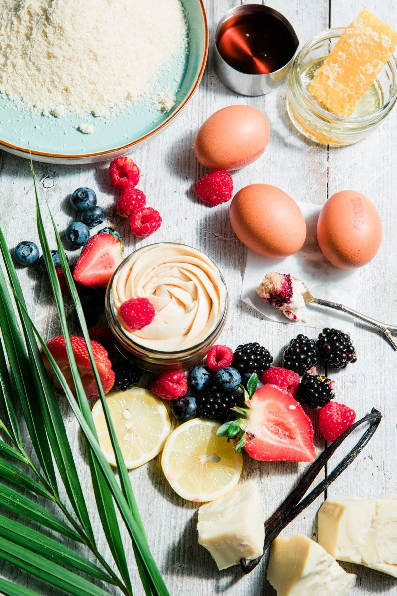 On-location ingredient flat lay for free-from dessert brand, natural ingredient styling with playful and indulgent visual tone