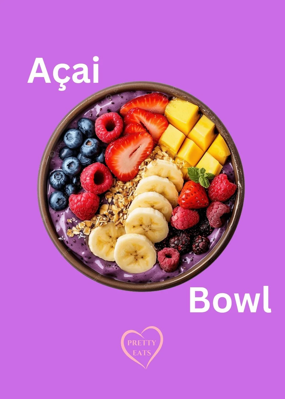 A bowl of acai topped with blueberries, raspberries, strawberries, banana slices, mango cubes, granola, and a mint leaf, on a purple background with the words 'Açai Bowl' and a