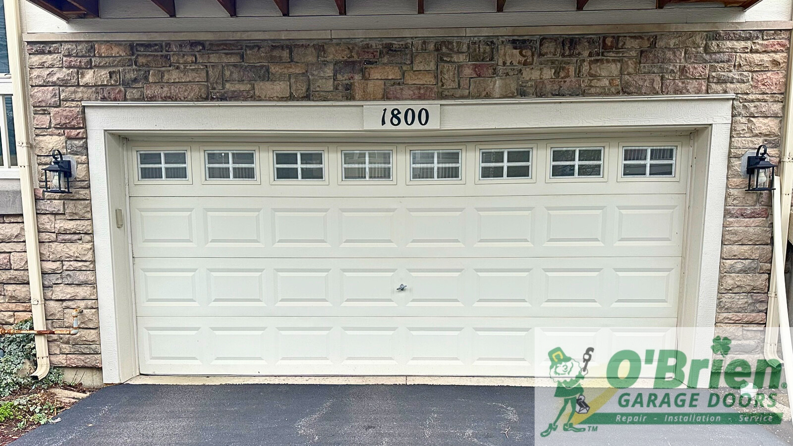 CHI model 2283 Steel Back Insulated Traditional Raised Panel Garage Door in Almond with Stockton Windows T12 w Vinyl Trim and Liftmaster 12 HP Belt Drive 7