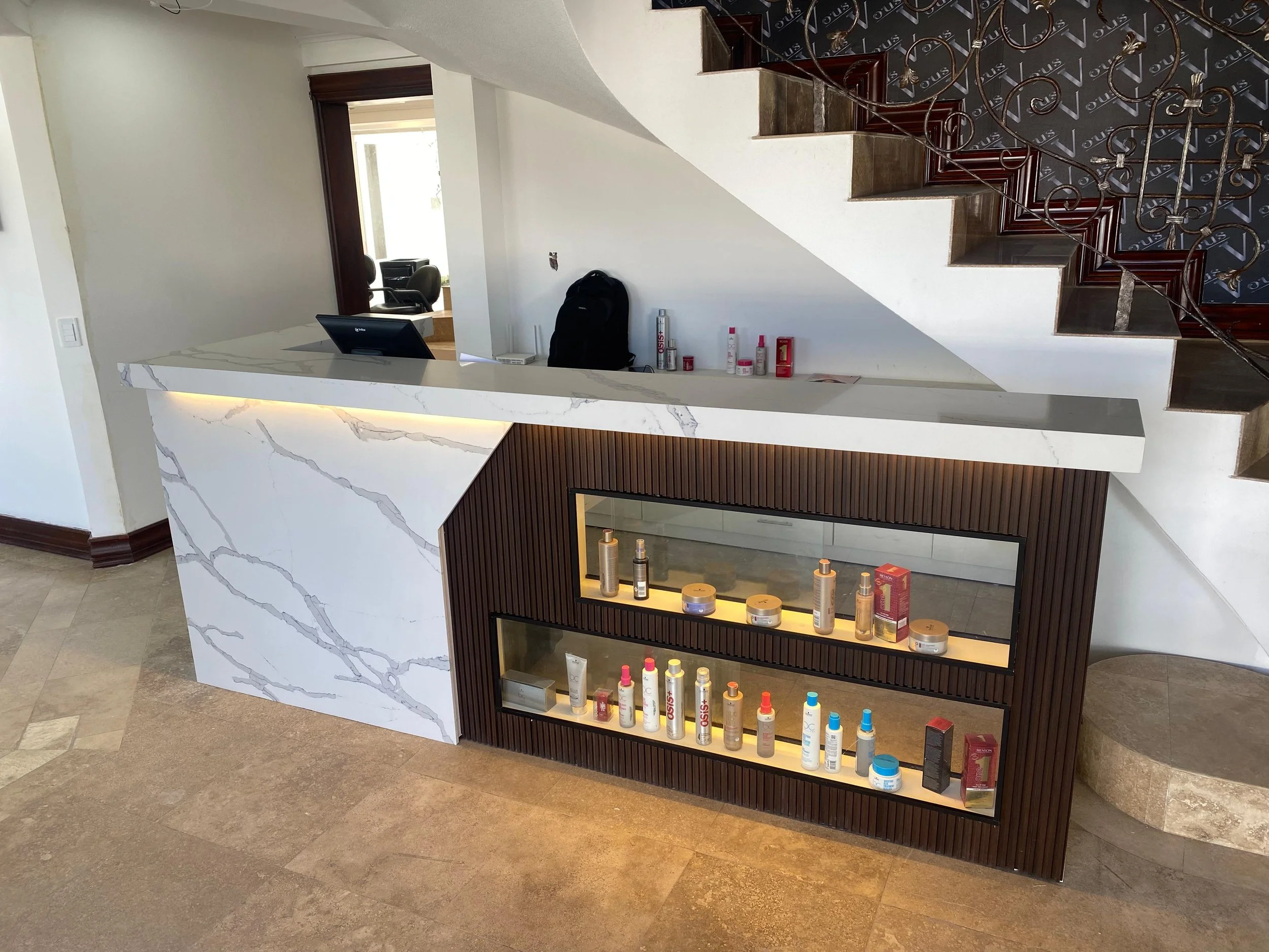 Hair salon reception desk design and construction project (other salon areas out of scope)