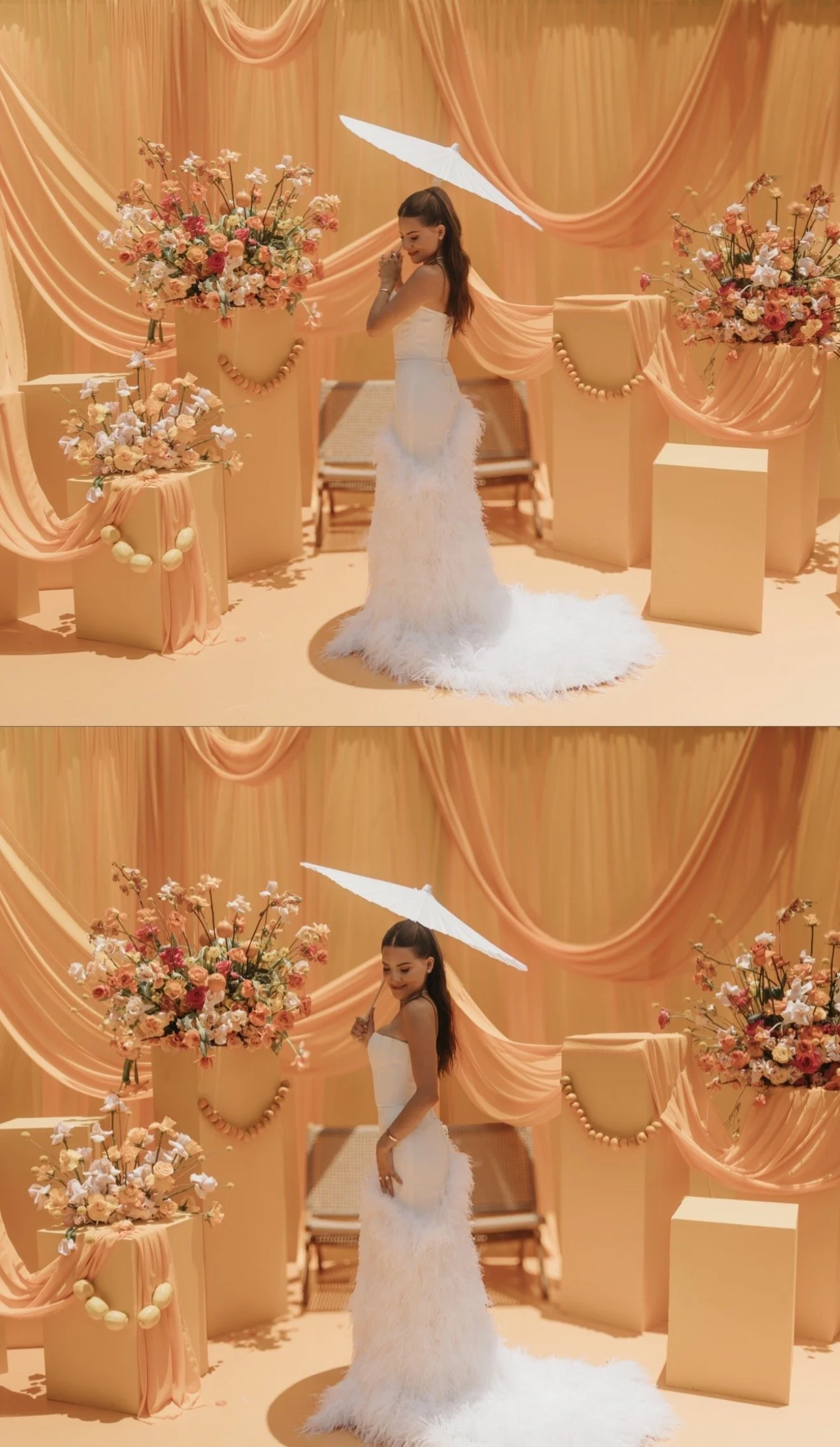 A woman in a white wedding dress holding a white umbrella in a peach-colored decorated setting with flowers, drapes, and chairs.