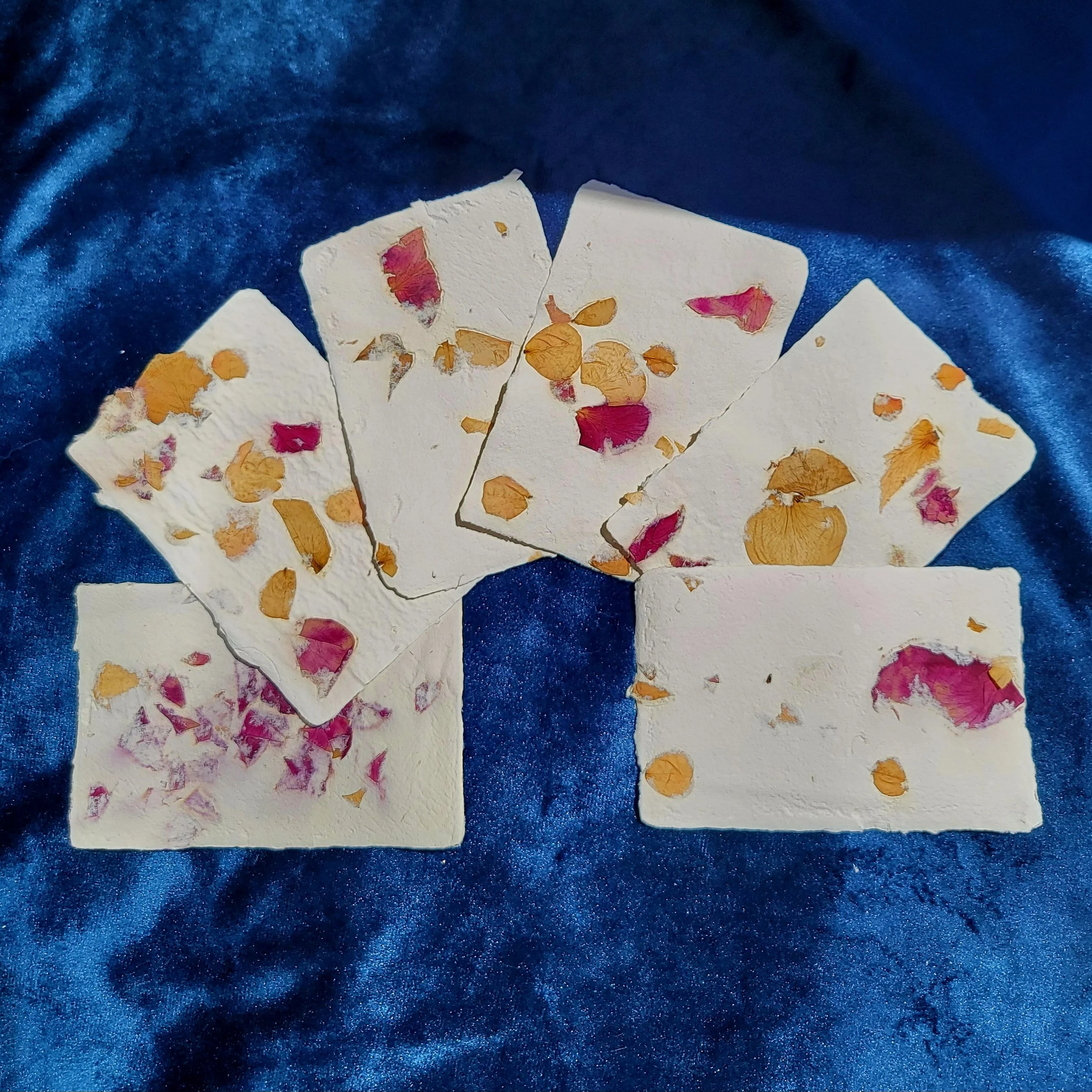 recycledflowerpetalpaperyellowandred.jpg