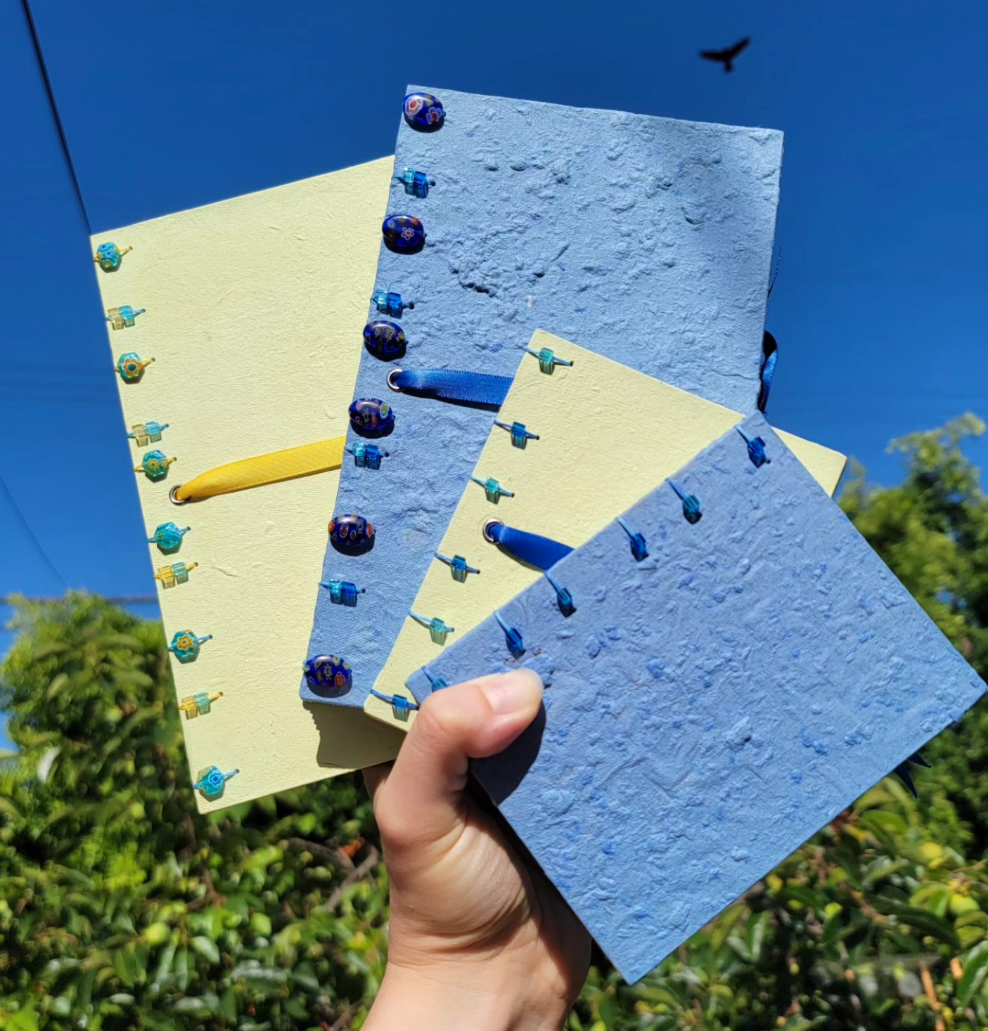 Hardcover Double Coptics made with my handmade recycled paper and glass millefiori beads