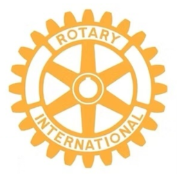 Logo of Rotary International featuring a yellow gear wheel with the words 'Rotary International' and the Rotary emblem in the center.