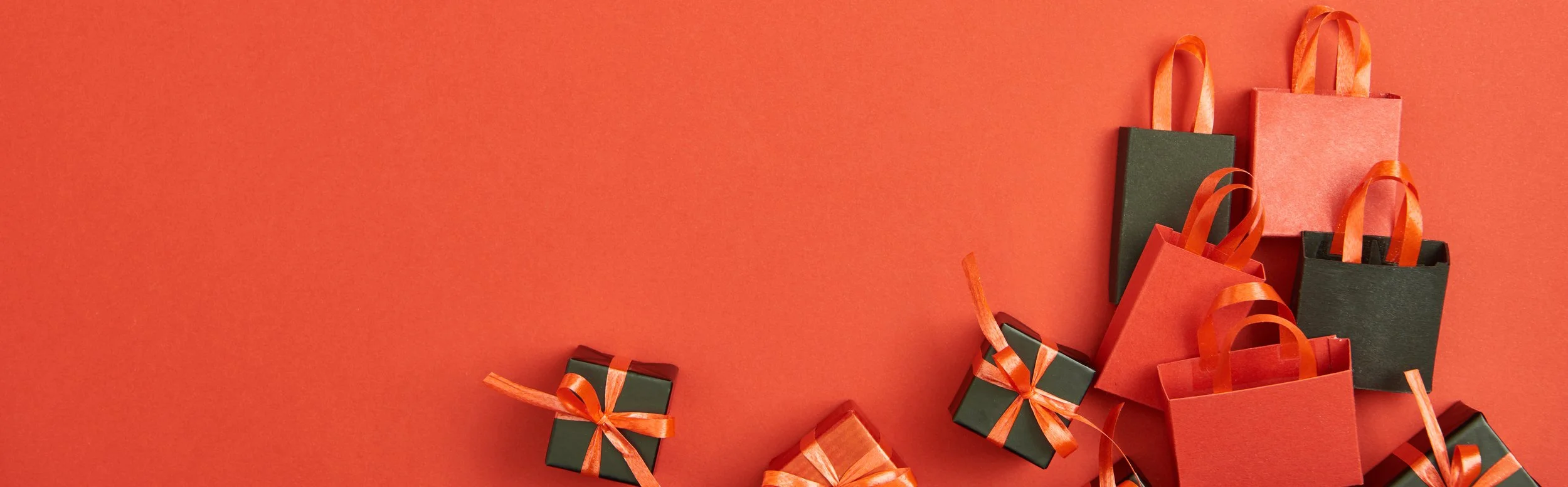 Wrapped Holiday Presents on Red Background