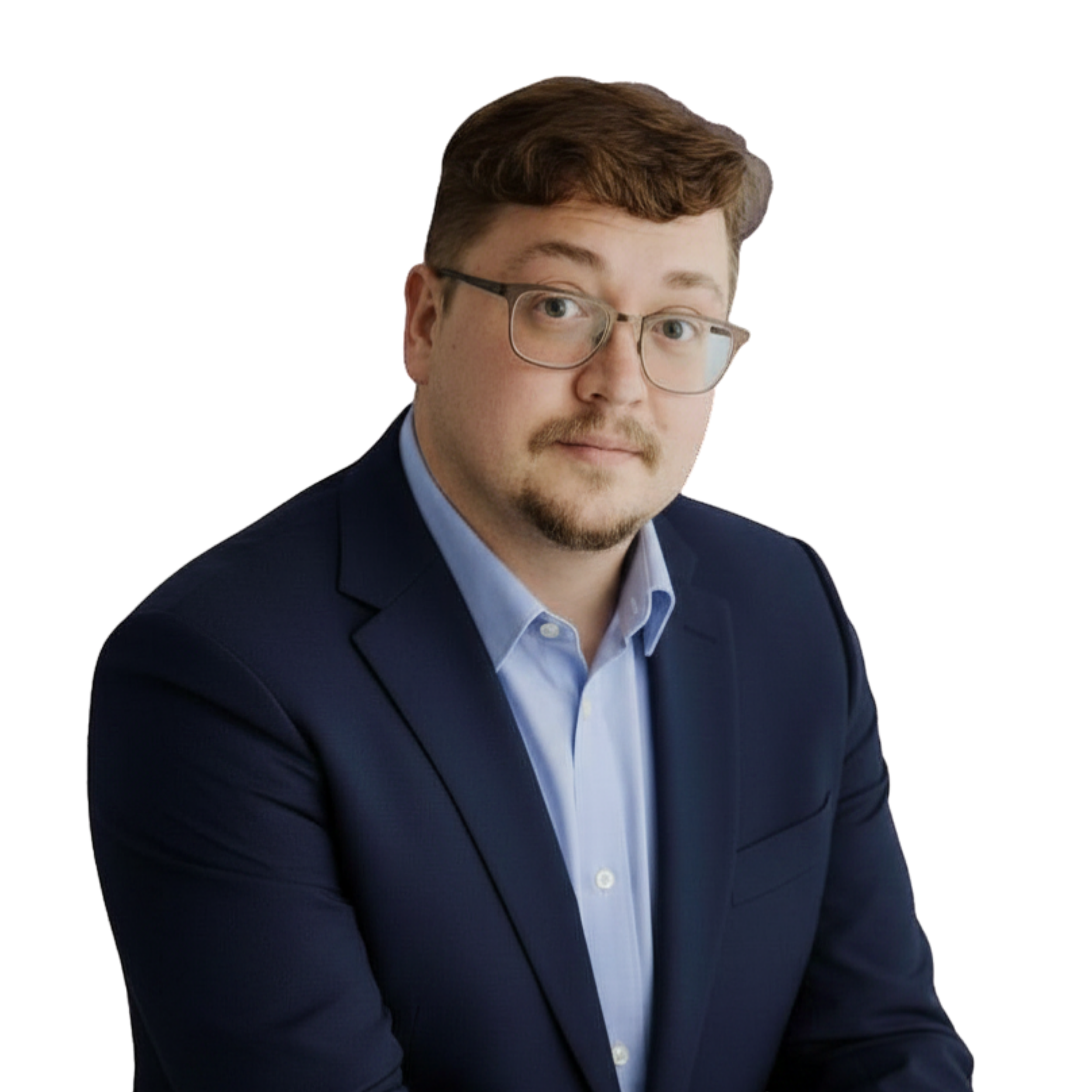 A man with brown hair, glasses, and a goatee wearing a dark suit and light blue shirt, looking towards the camera with a slight smile. Anton Zaplakhov, VP of Product NodeAI