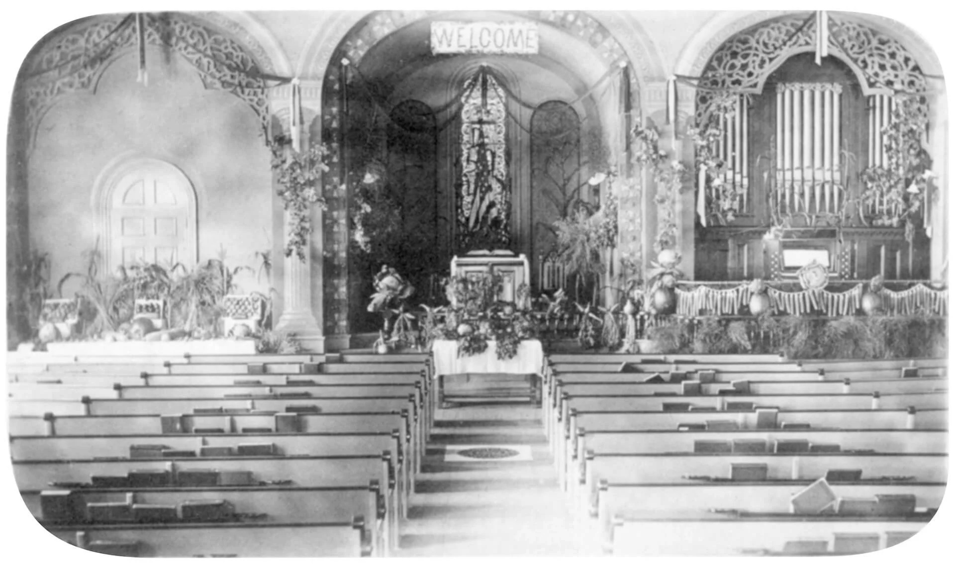 The Sanctuary decorated for Thanksgiving before 1931.