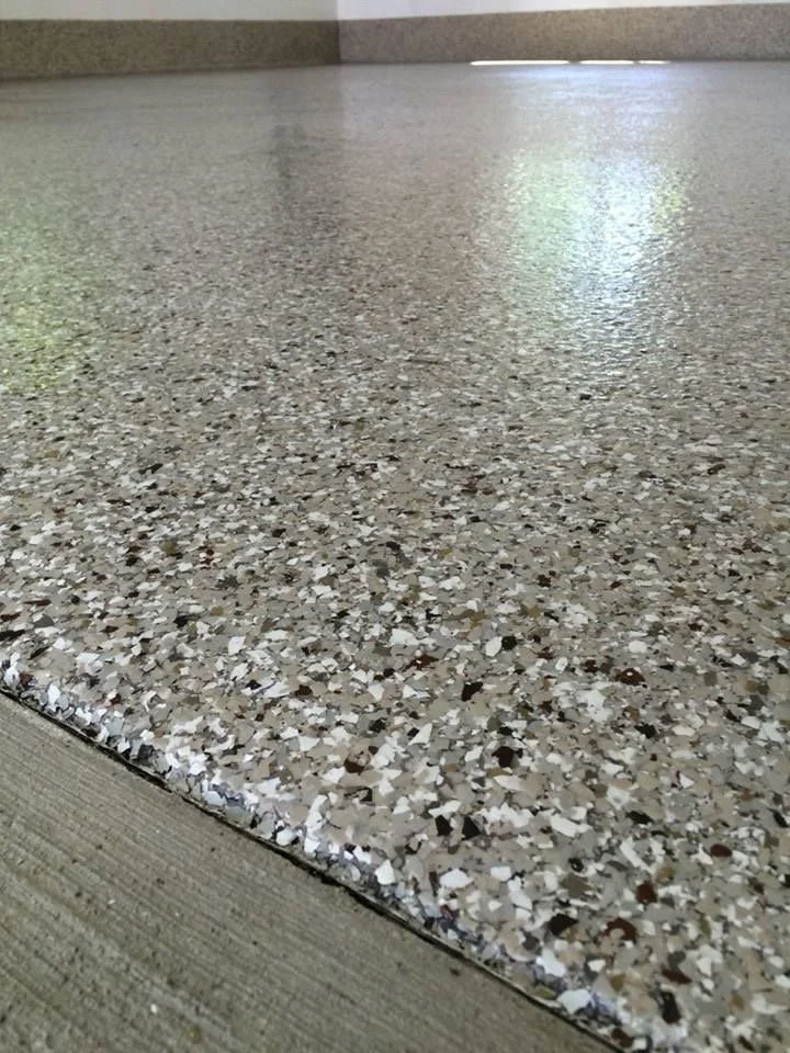 Close-up of a garage epoxy chip flake flooring system 