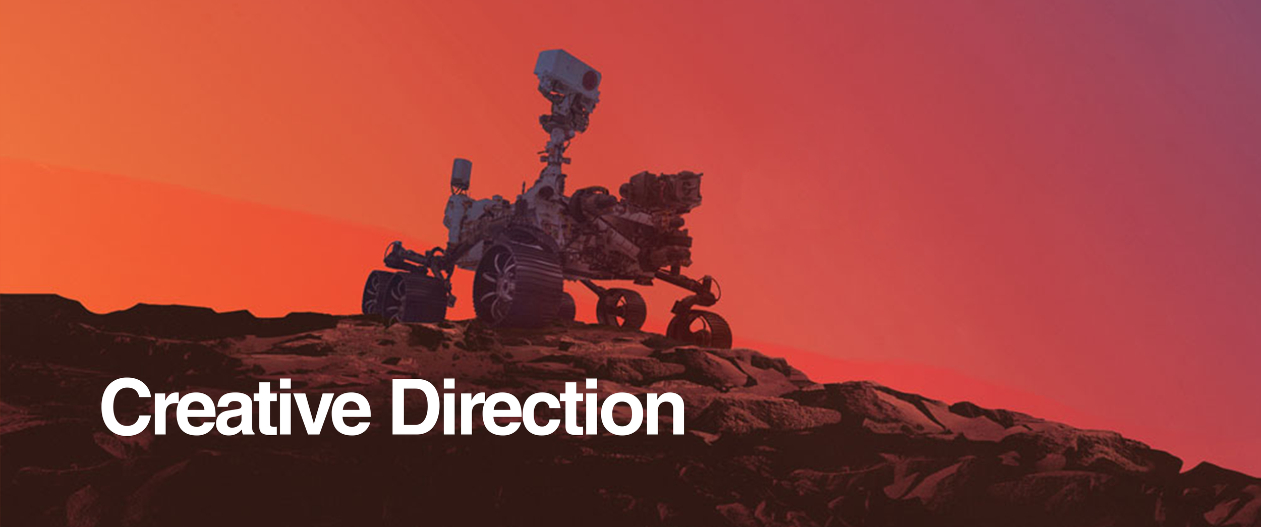 An artist's rendering of a Mars rover on a rocky landscape with a pinkish sky at sunset, and the words 'Creative Direction' in bold white text at the bottom.