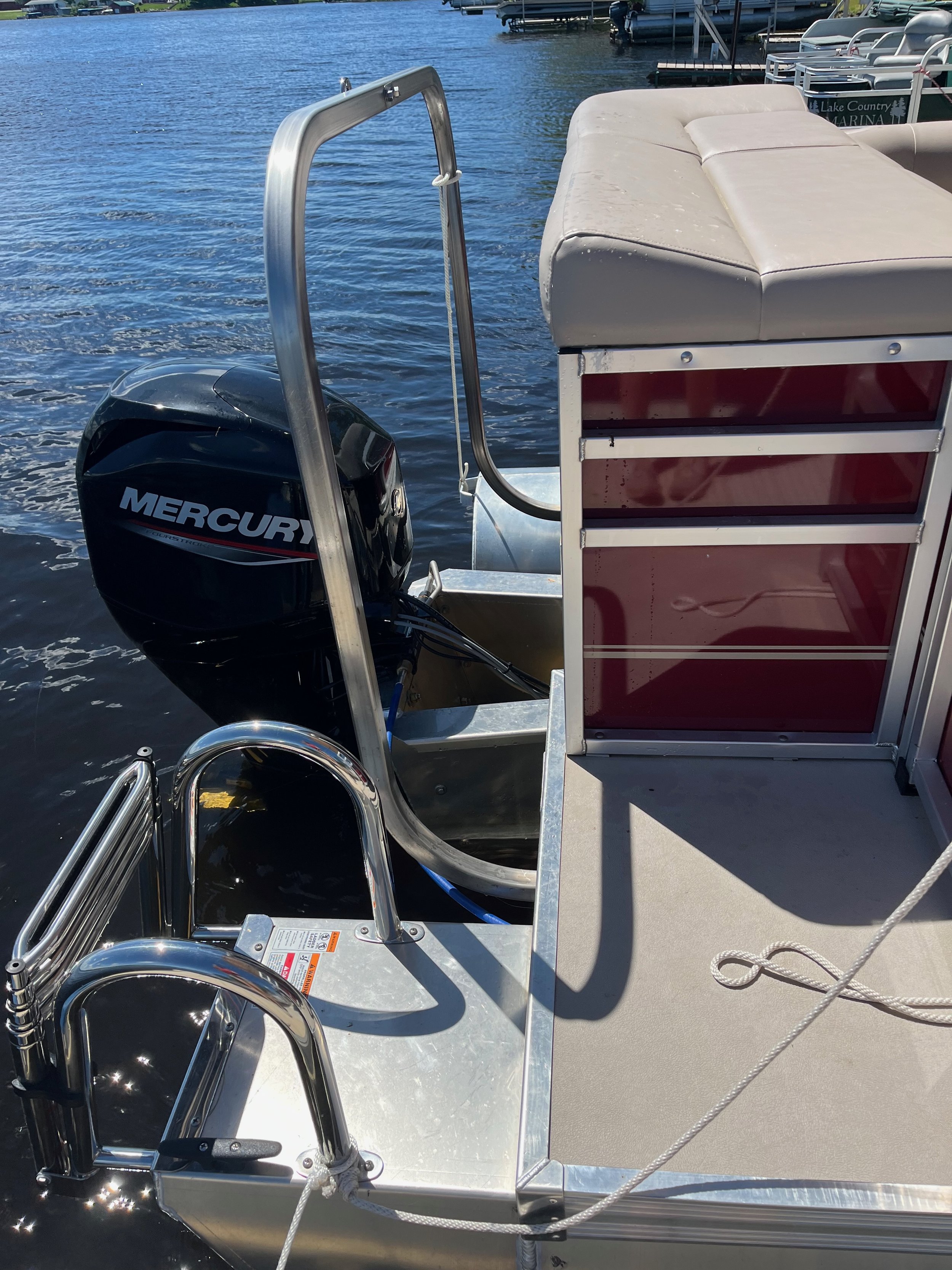 Mercury on pontoon.jpeg