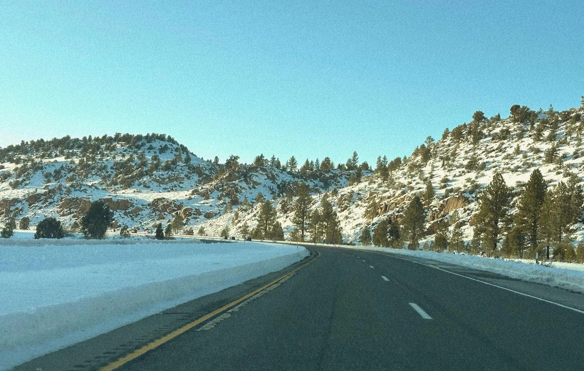 Winter driving on Highway 395 in the Eastern Sierra north of Bishop, California