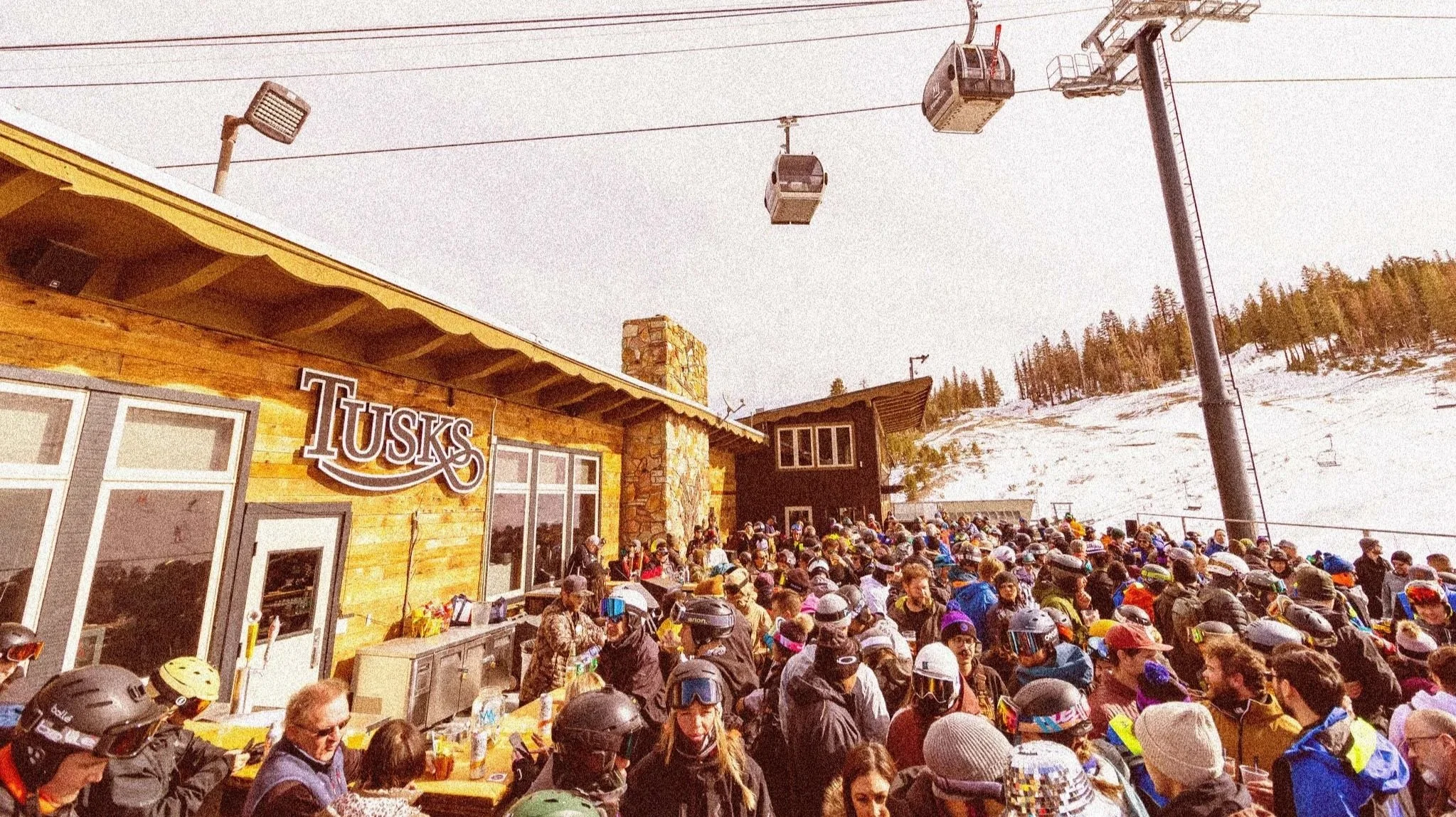 Skiers gathering for après-ski at Mammoth Mountain