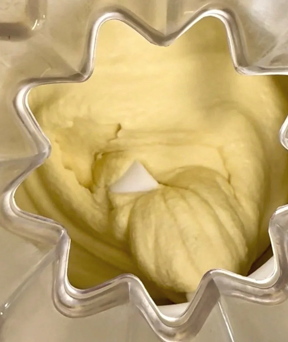 Homemade vanilla ice cream churning in an ice cream maker