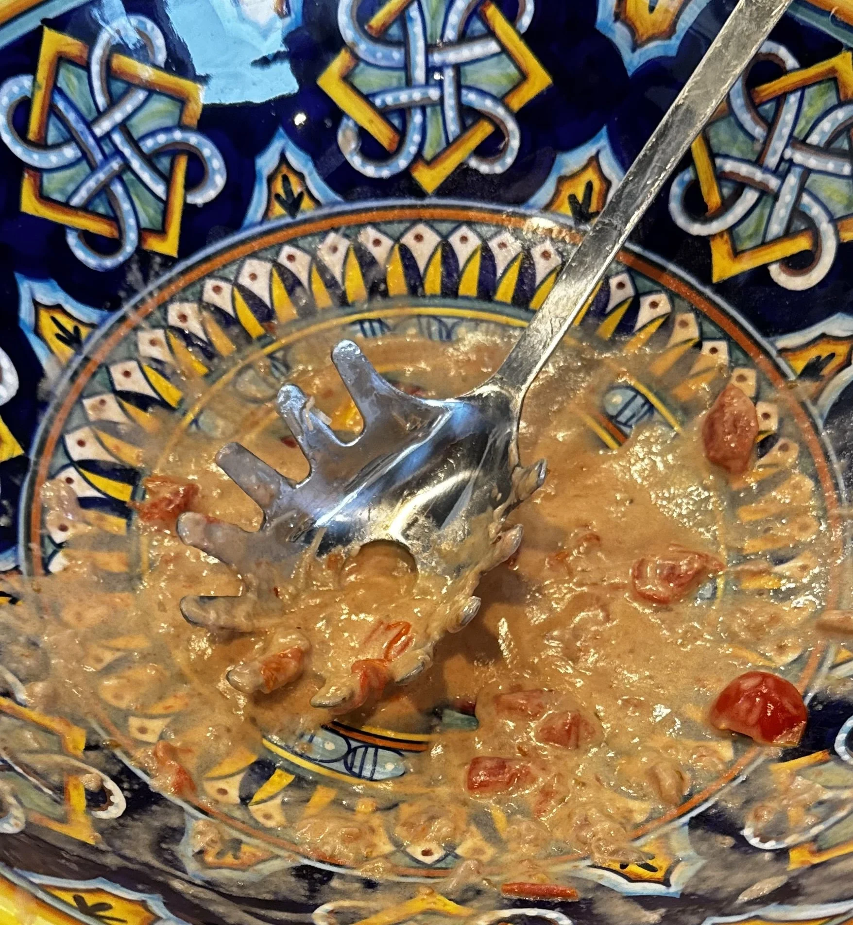 Creamy red wine tomato pasta sauce in a bowl.