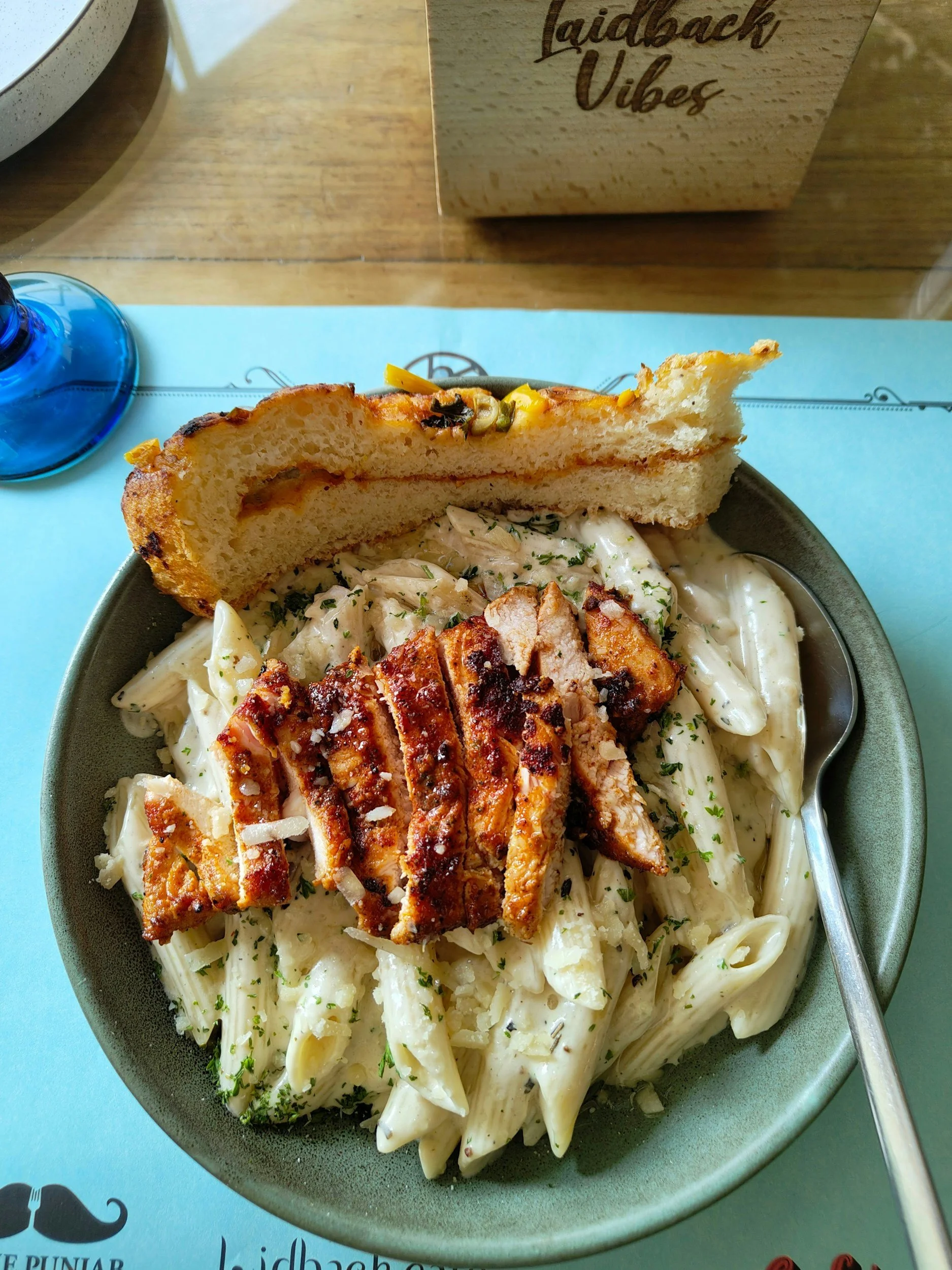 Jerk Pasta Alfredo with bread-main menu