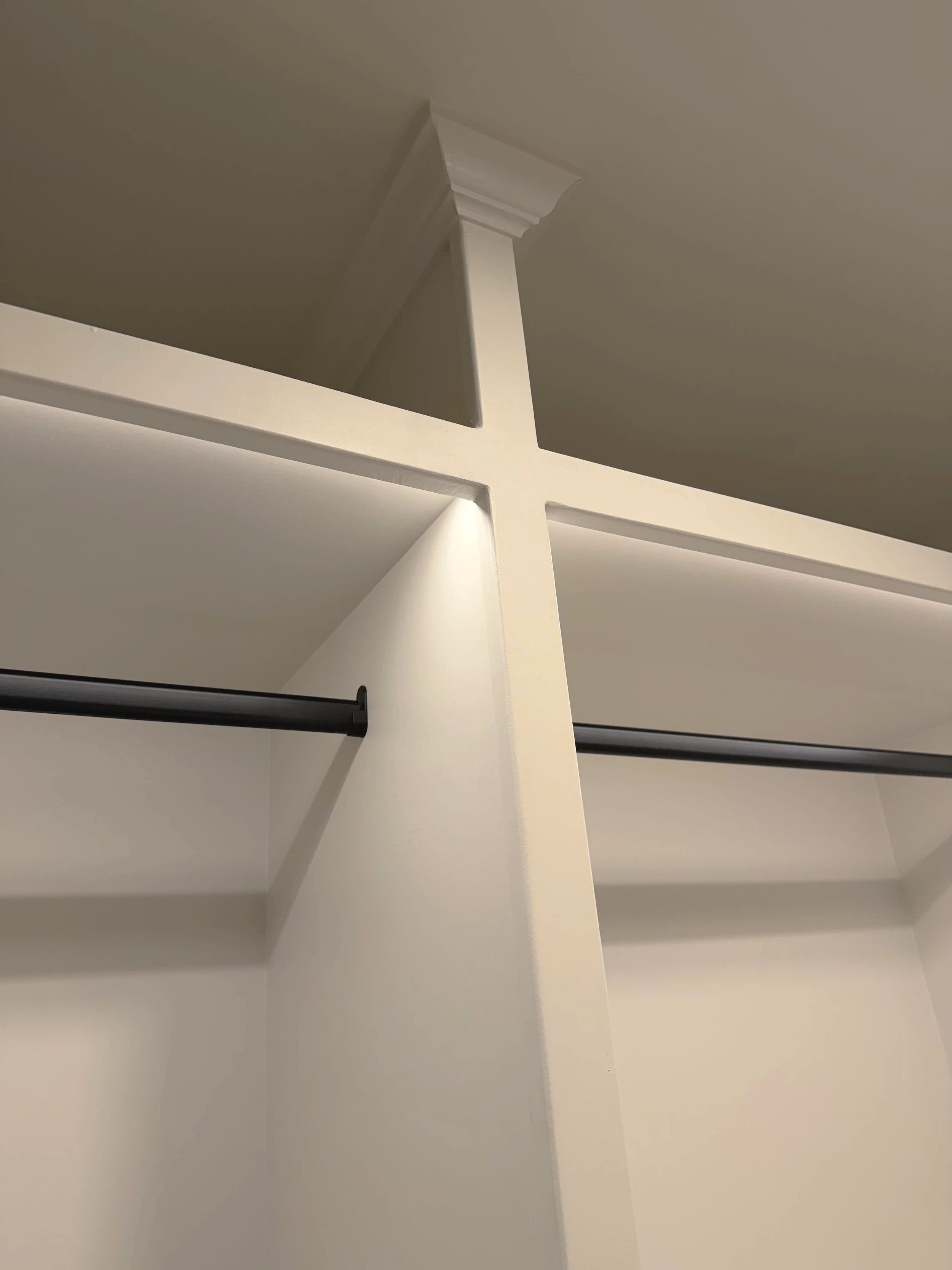 Custom closet renovation featuring 3/4" birch bases, paint grade maple trim, and custom cut crown molding. LED integration with solder wiring was including with this project. 