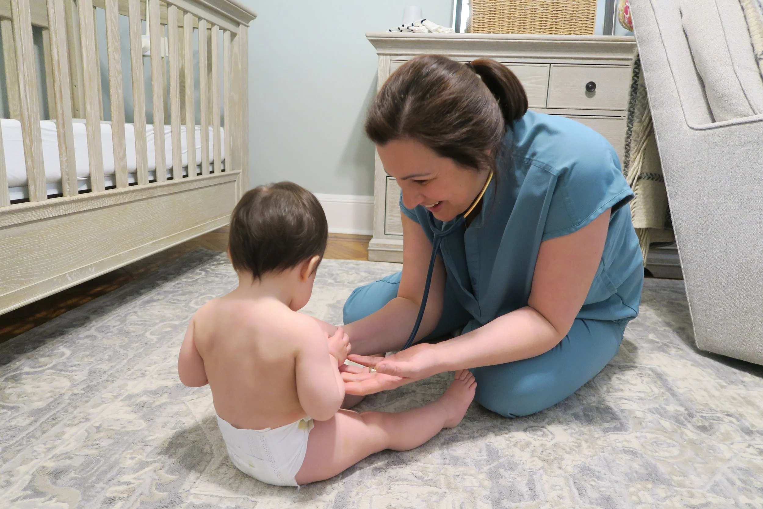 Dr Despina Tsevdos with infant