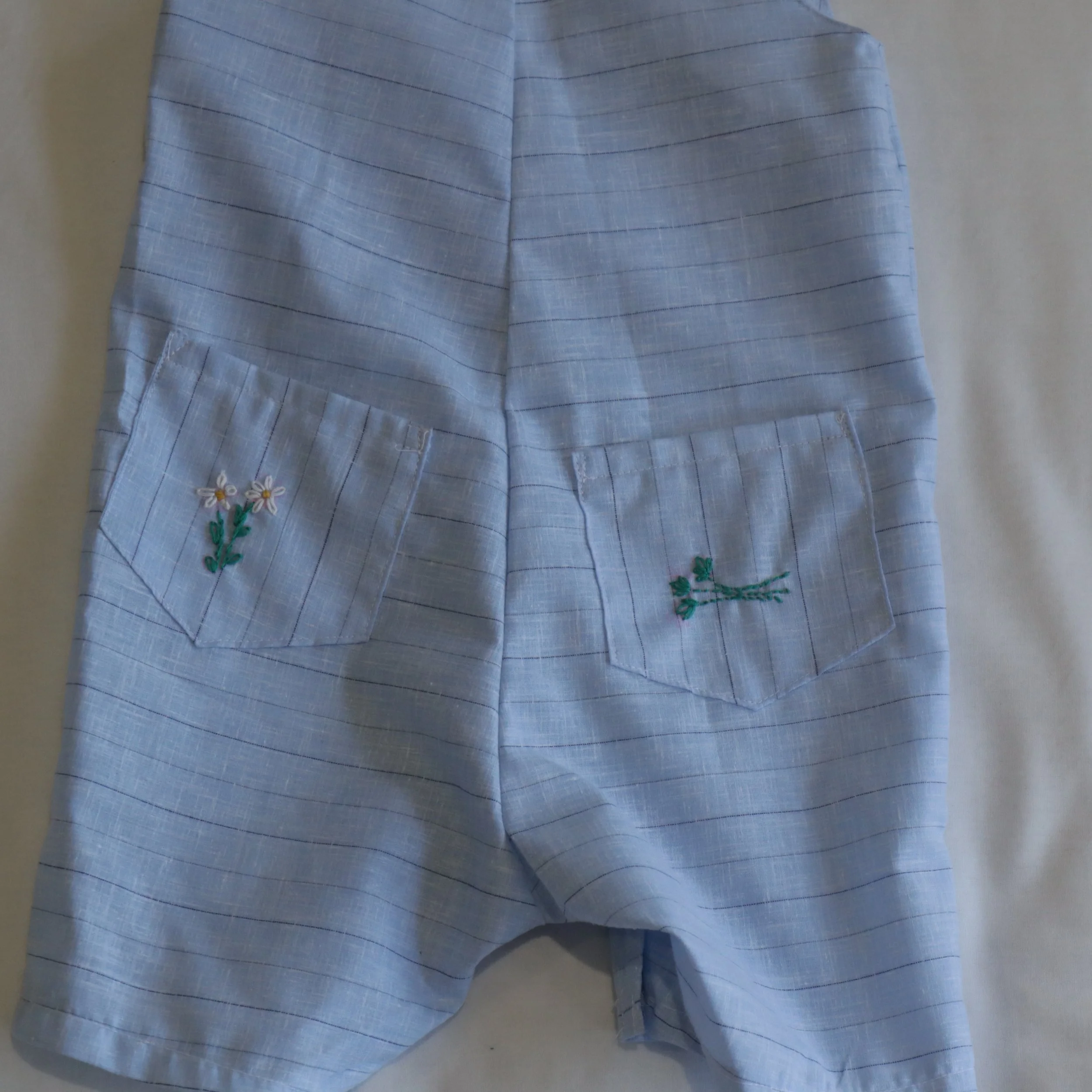 Cow embroided overall large back pocket.JPG