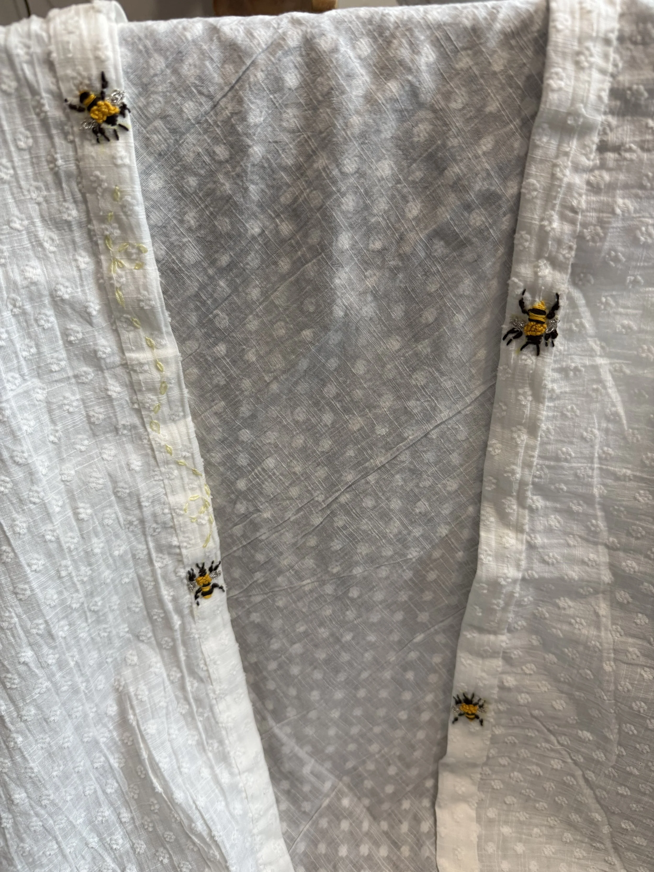 Hand-embroidered cotton baby wraps