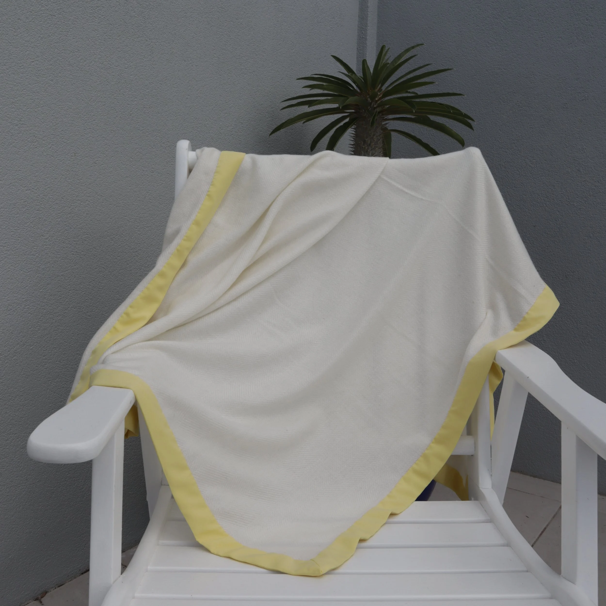 Cashmere blanket yellow and cream rolled.JPG