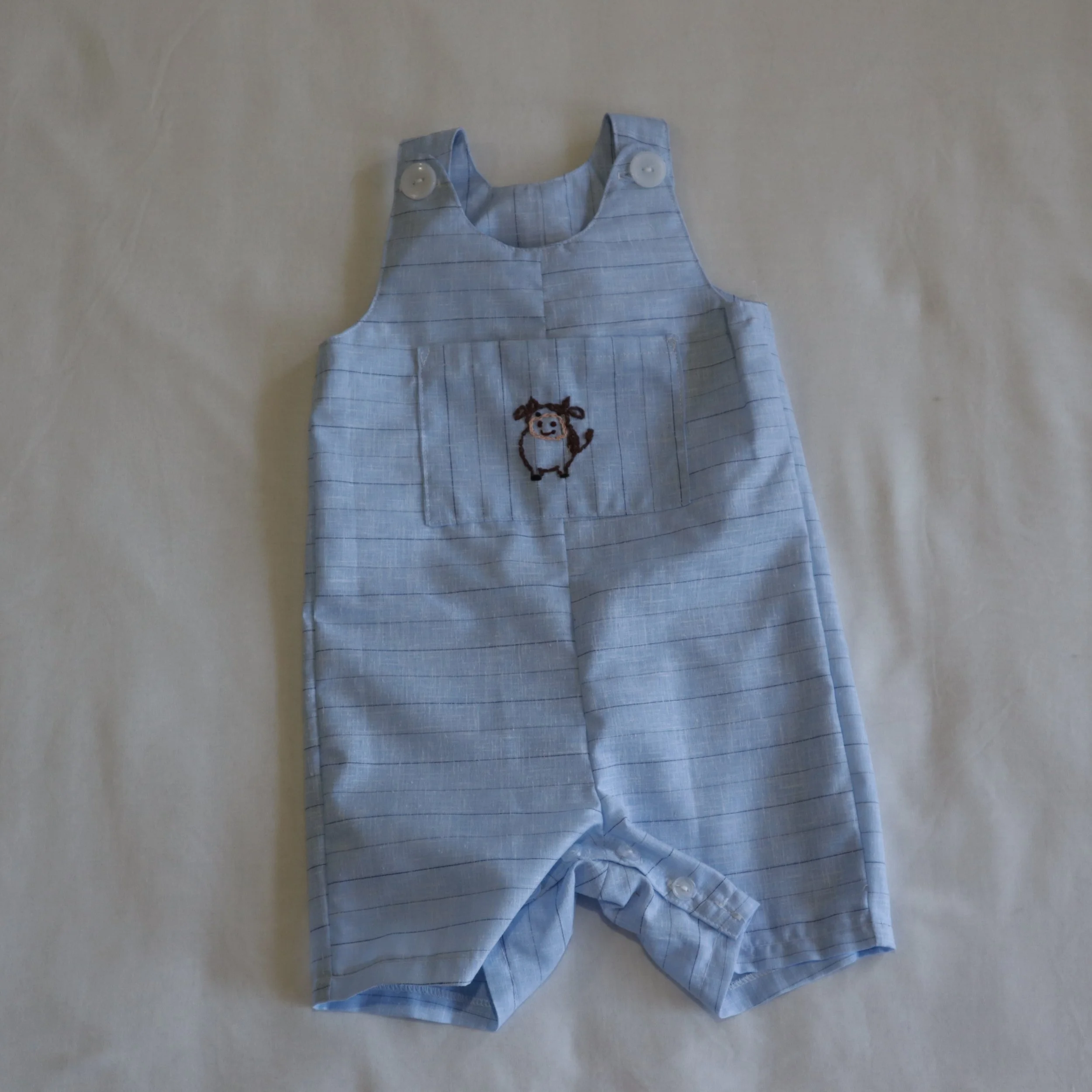 Cow embroided overall medium front.JPG