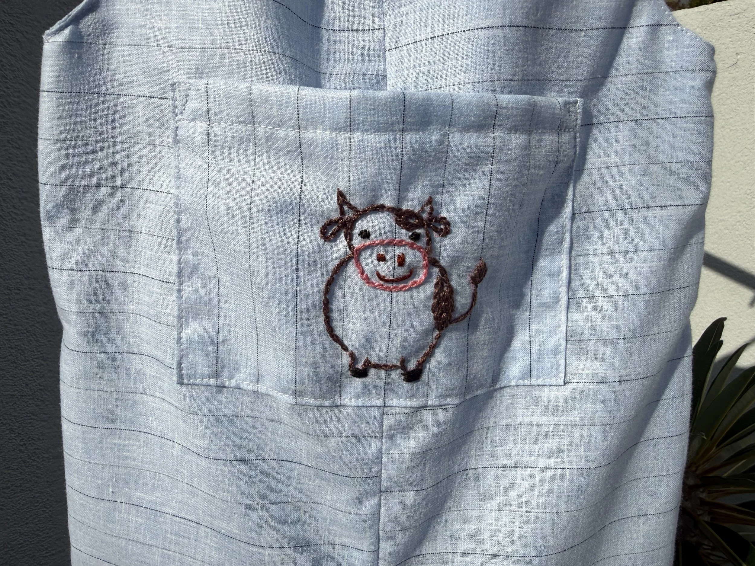 Cow embroidered large front pocket.jpeg