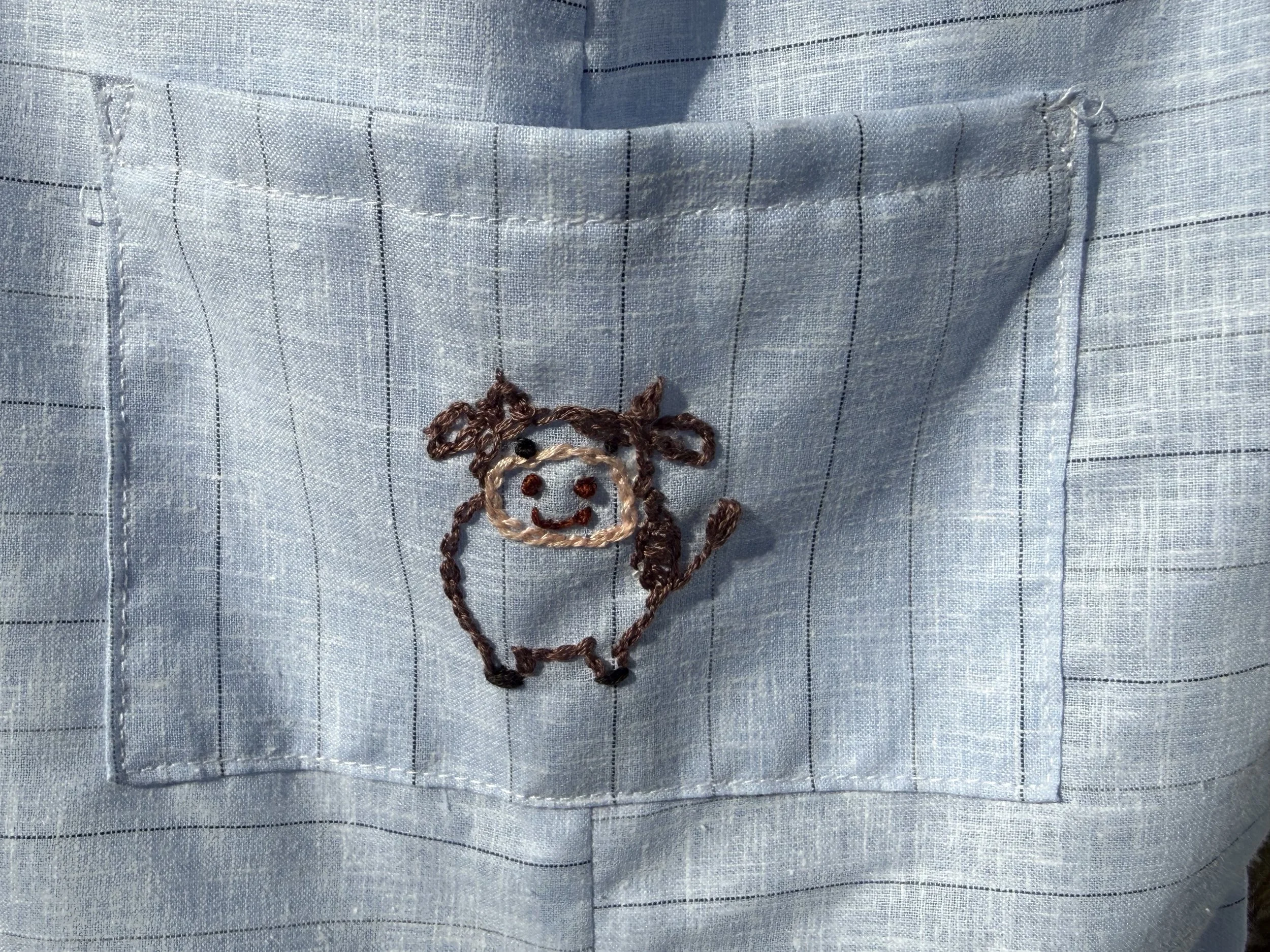Cow embroidered medium front pocket.jpeg