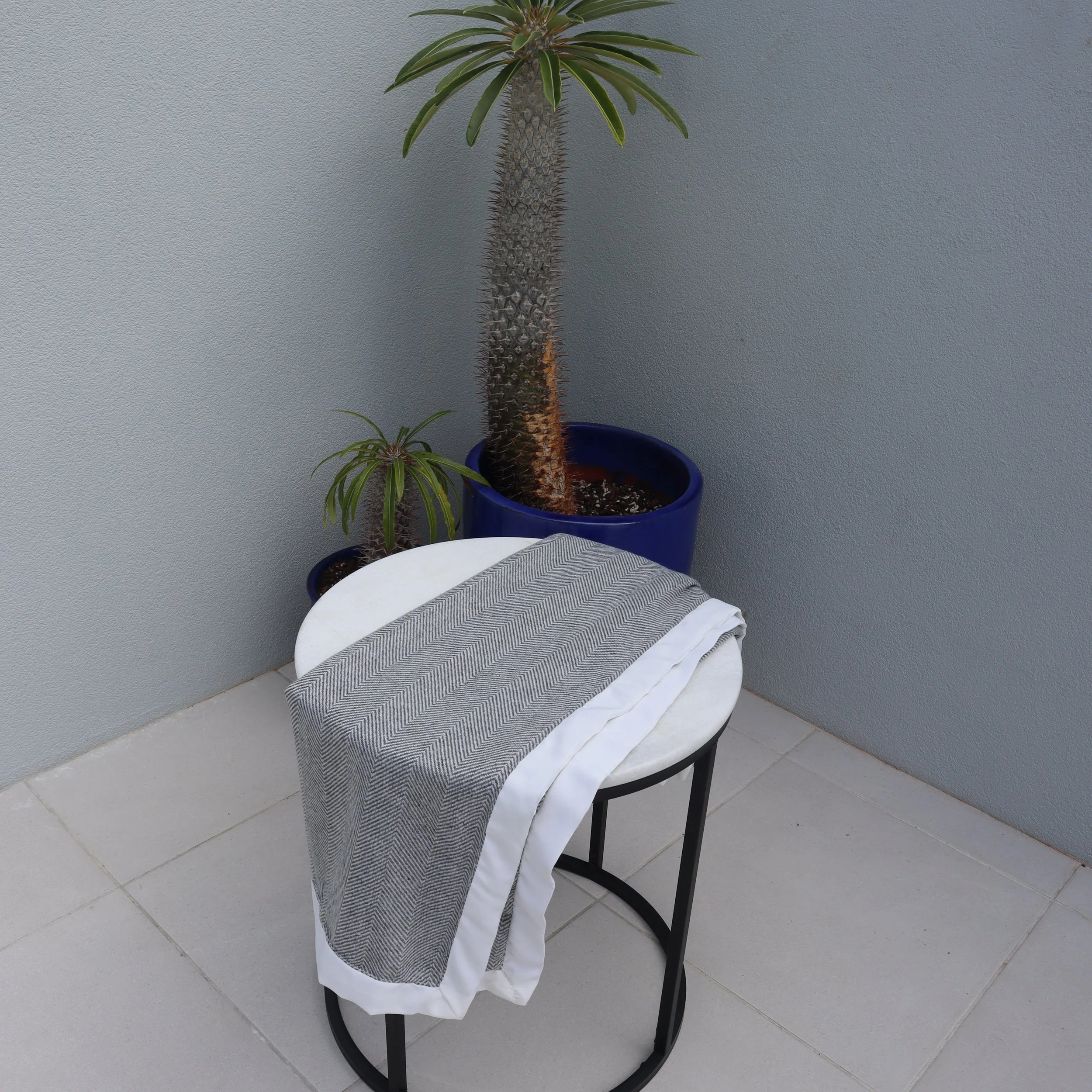 Stroller Blanket grey & silver with cream haved side ways.JPG