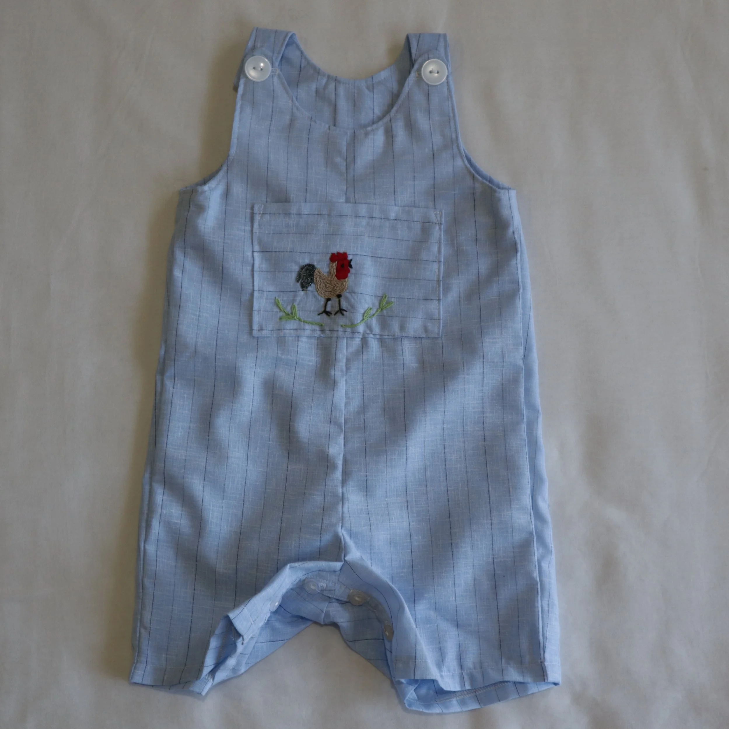 Roster embroided overall large front.JPG
