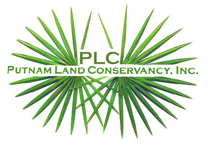 Logo of Putnam Land Conservancy, Inc. with a large green palm leaf design in the background.