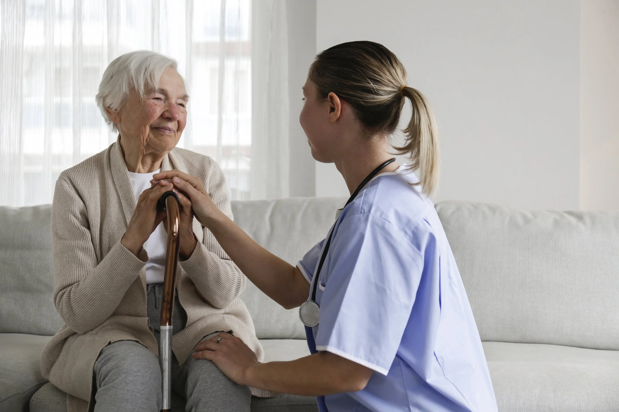 Healthcare worker supporting patient
