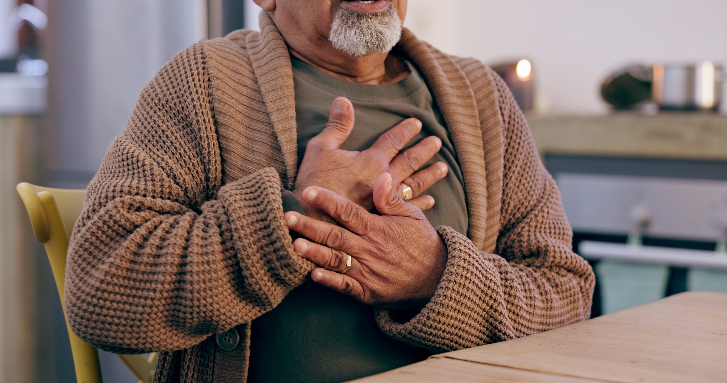 Person clutching chest