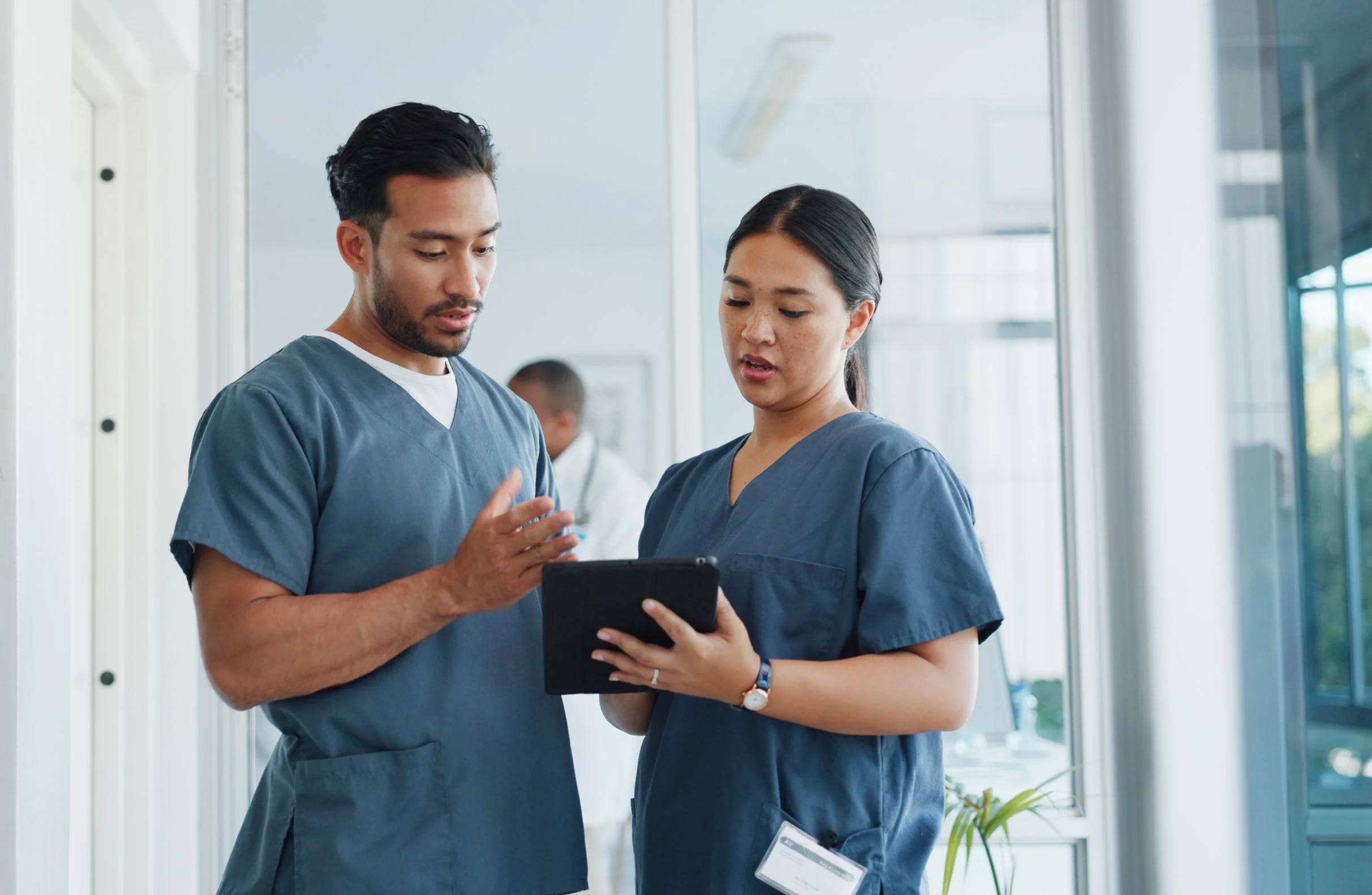two nurses talking