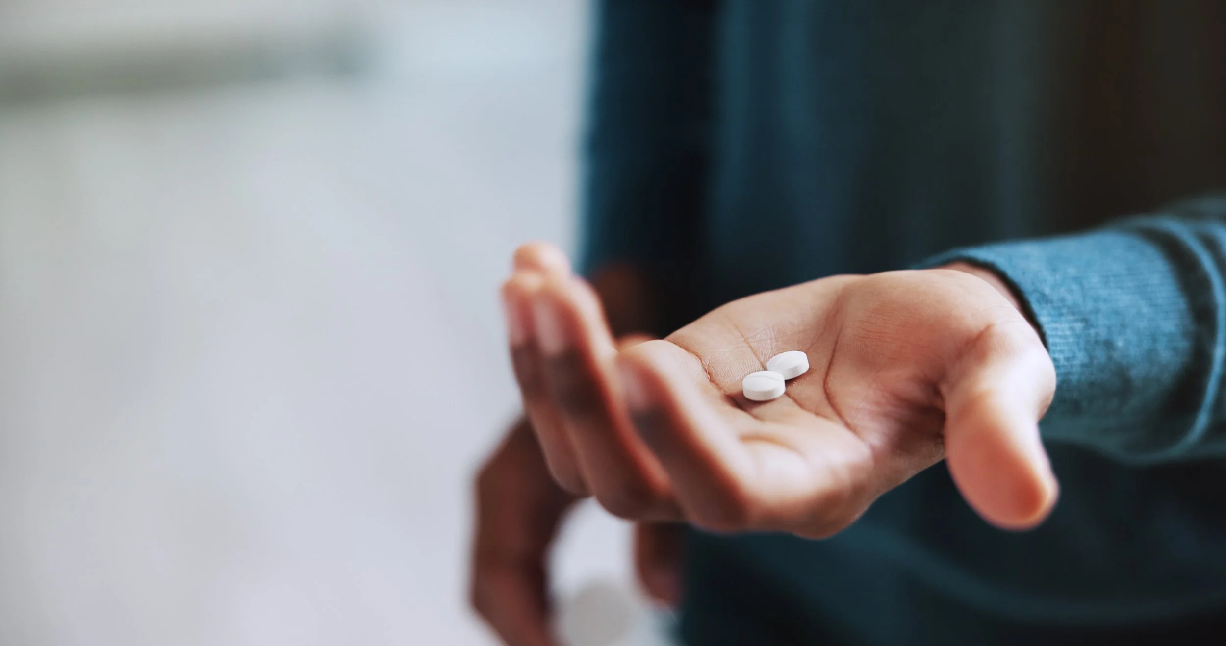 Hand holding medication