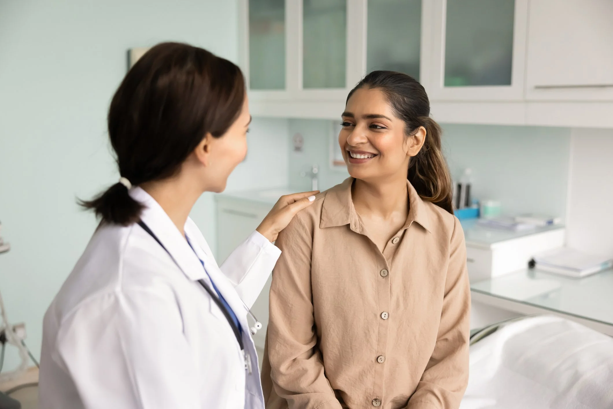 Woman and doctor talking