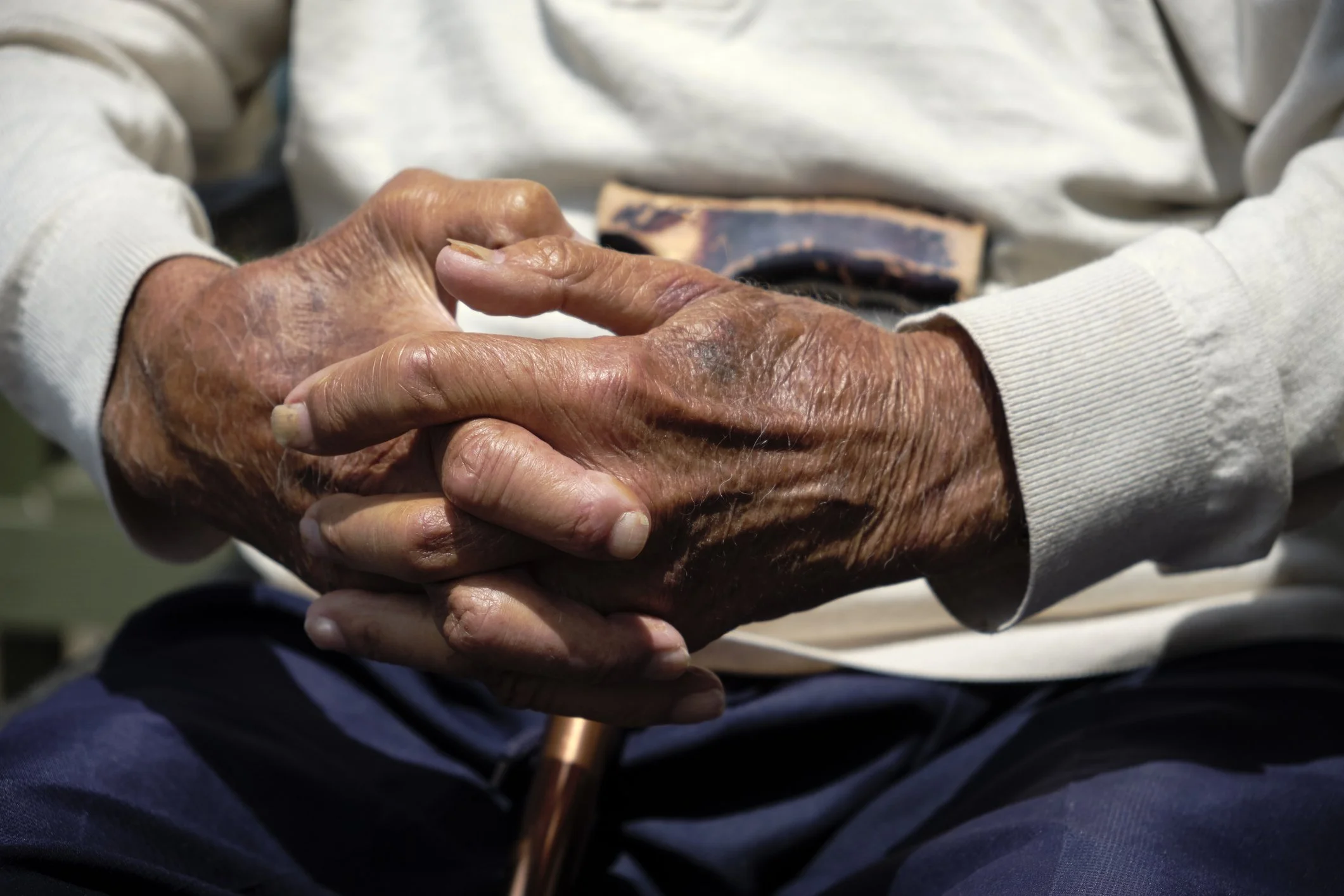 Hands clasped together