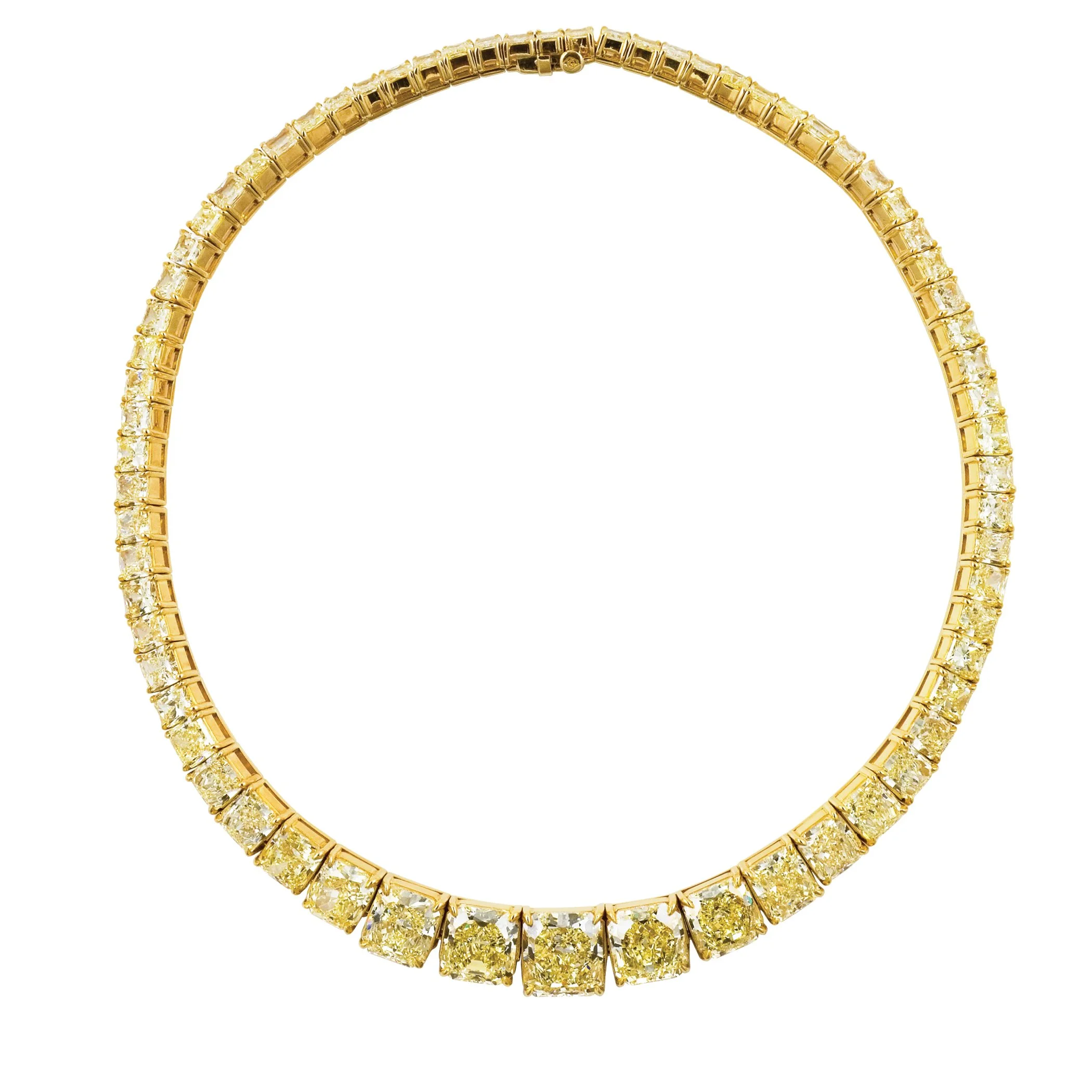 A gold and diamond necklace with a pattern of rectangular gemstones.