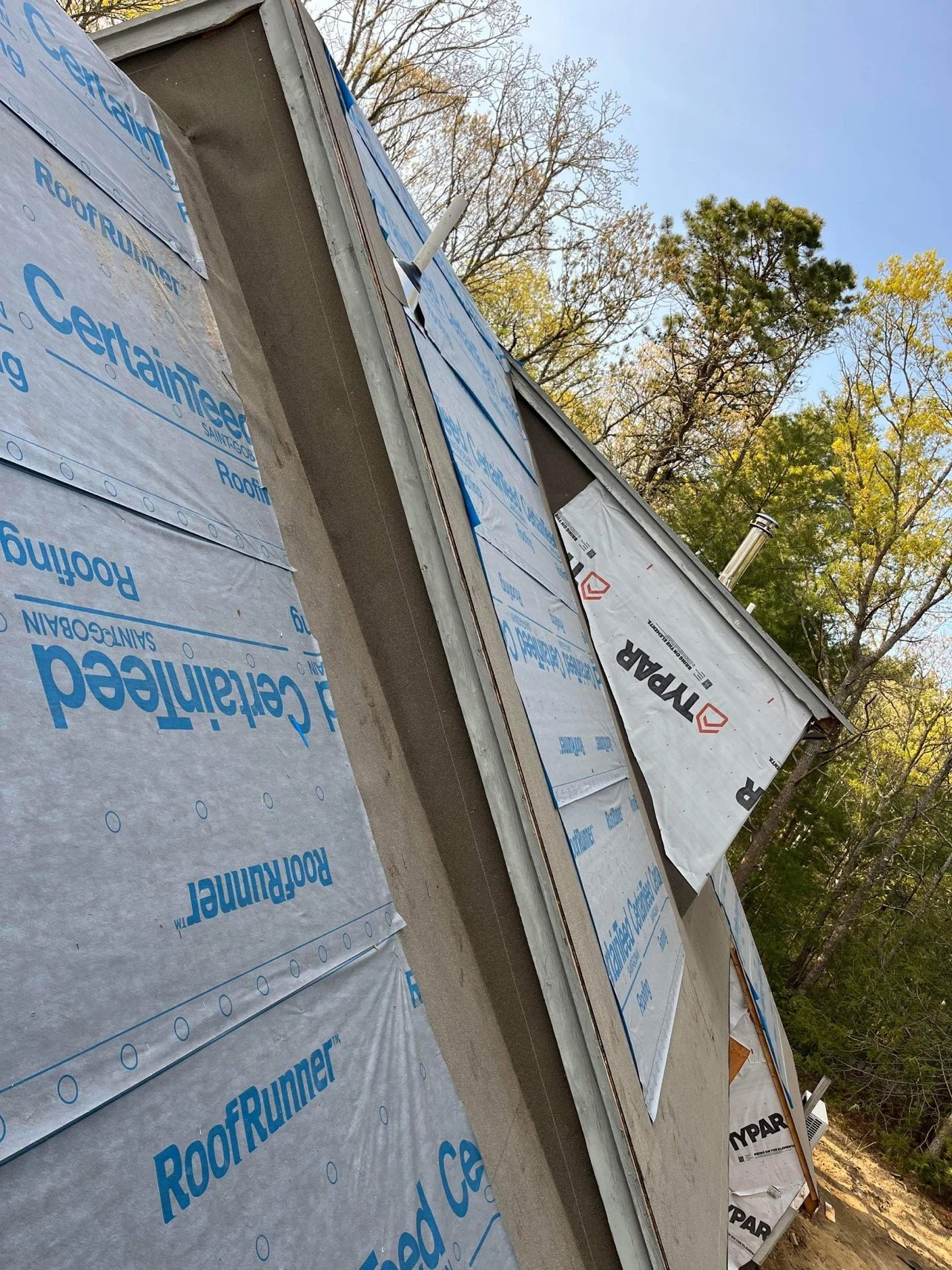 Roofing and siding installation in Cape Cod, MA with weatherproof exterior protection system.