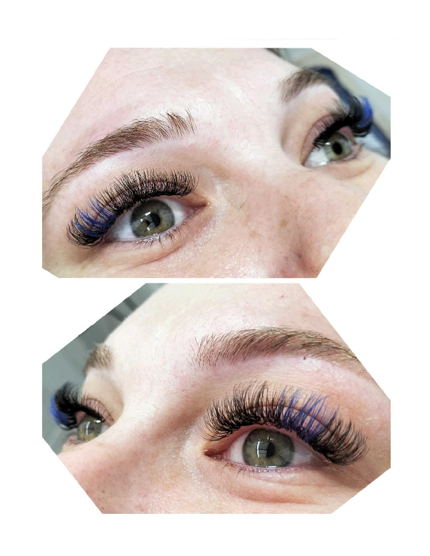 Close-up of a person's eyes showing fresh eyelash extensions with blue and black colors, slight redness around the eyelids, and natural eyebrows.