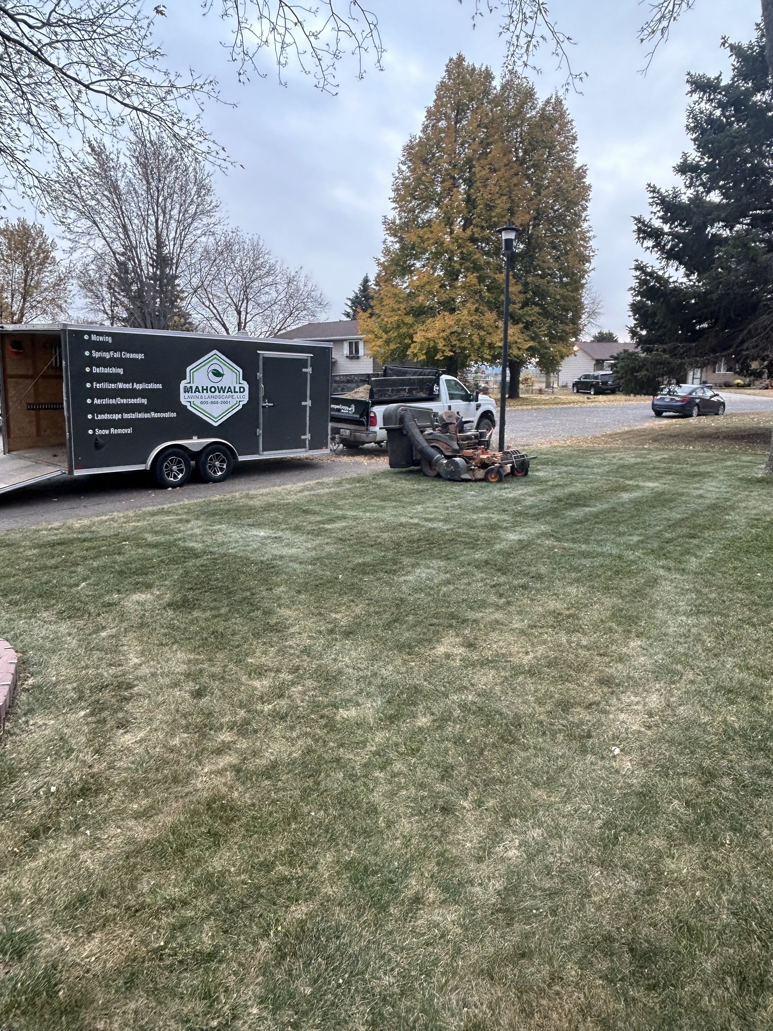 Lawn maintenance services in Watertown, SD featuring professional mowing equipment and seasonal yard care.