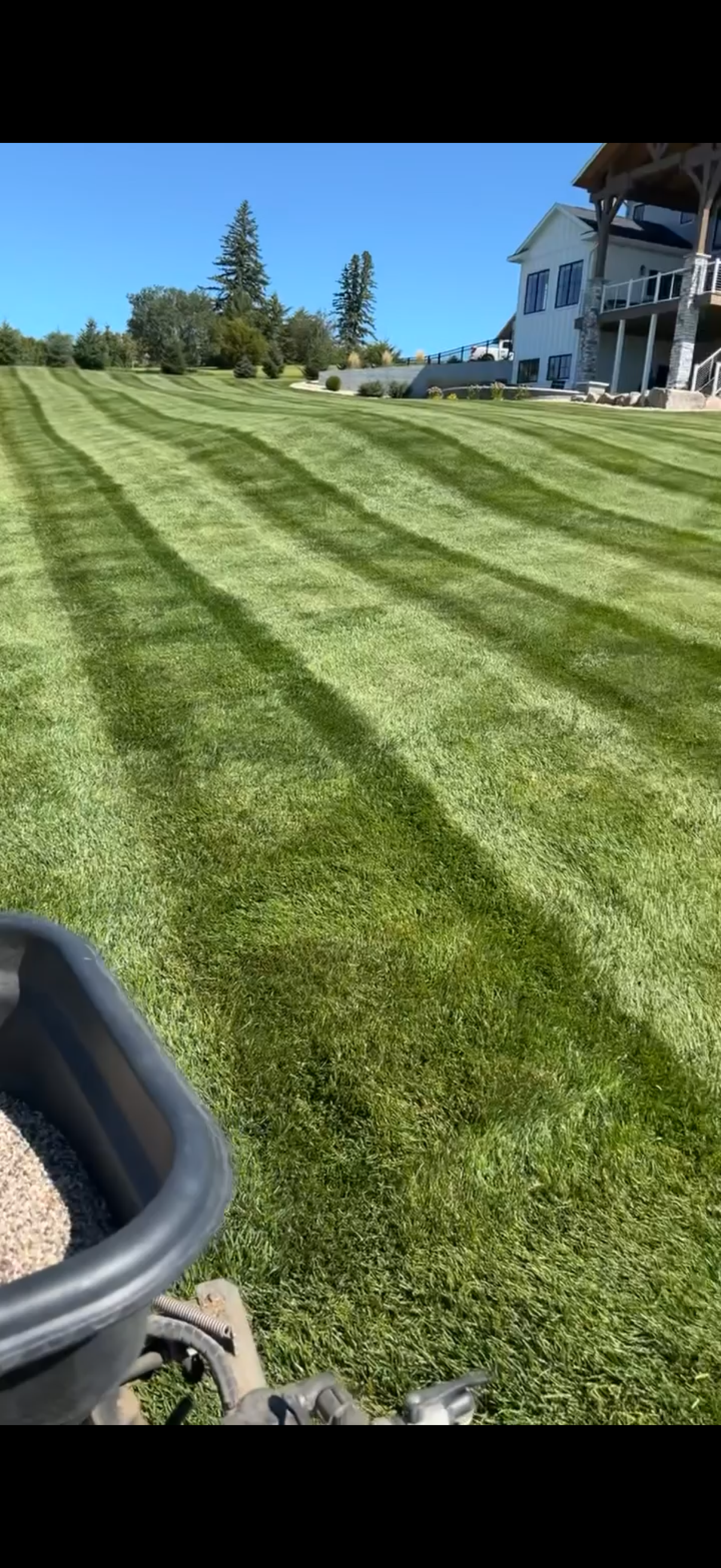 Weed control and lawn fertilization services in Watertown, SD creating thick, green, and striped lawn results. Our treatments promote healthy growth and long-lasting lawn quality.