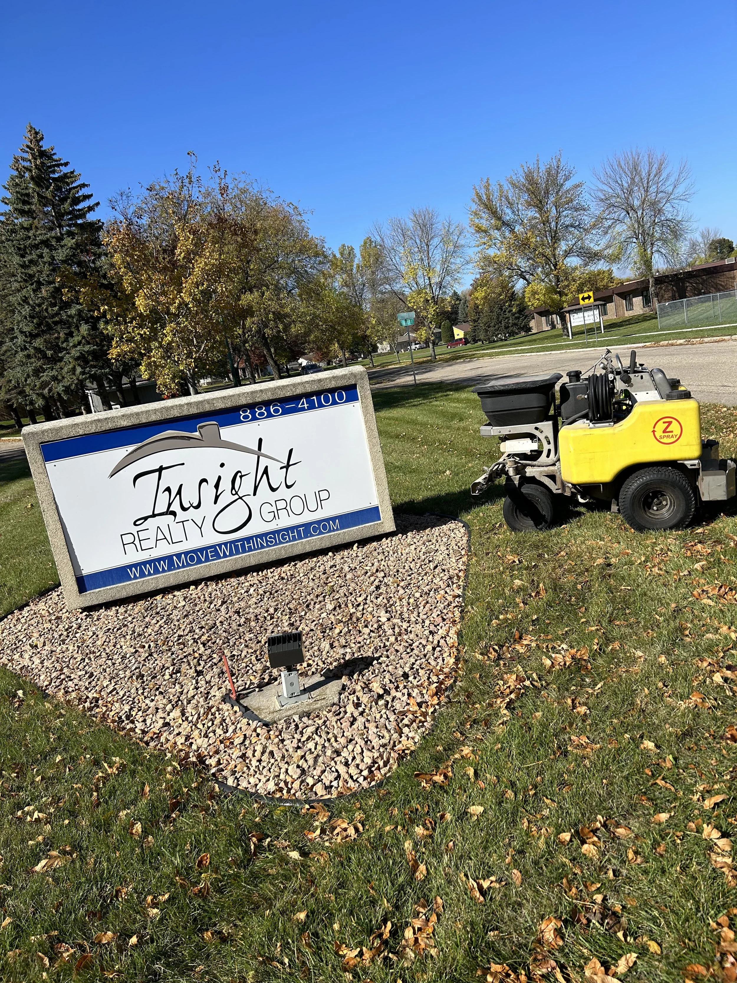 Weed control and lawn fertilization services in Watertown, SD for commercial properties. This project shows professional lawn treatment to maintain healthy, green grass and clean landscape edges.