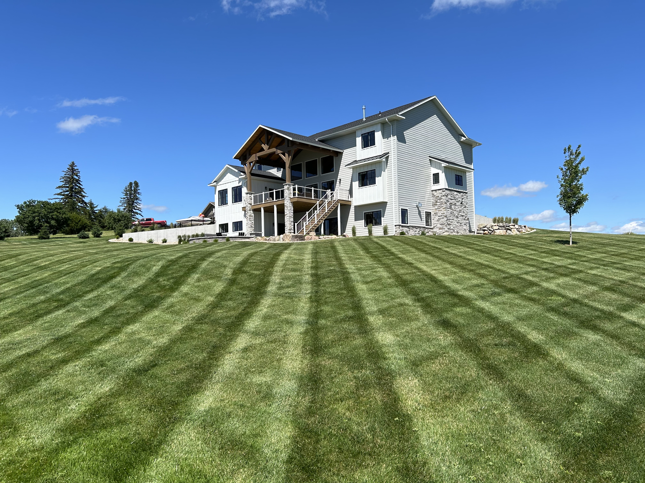 Weed control and lawn fertilization services in Watertown SD for healthy green grass