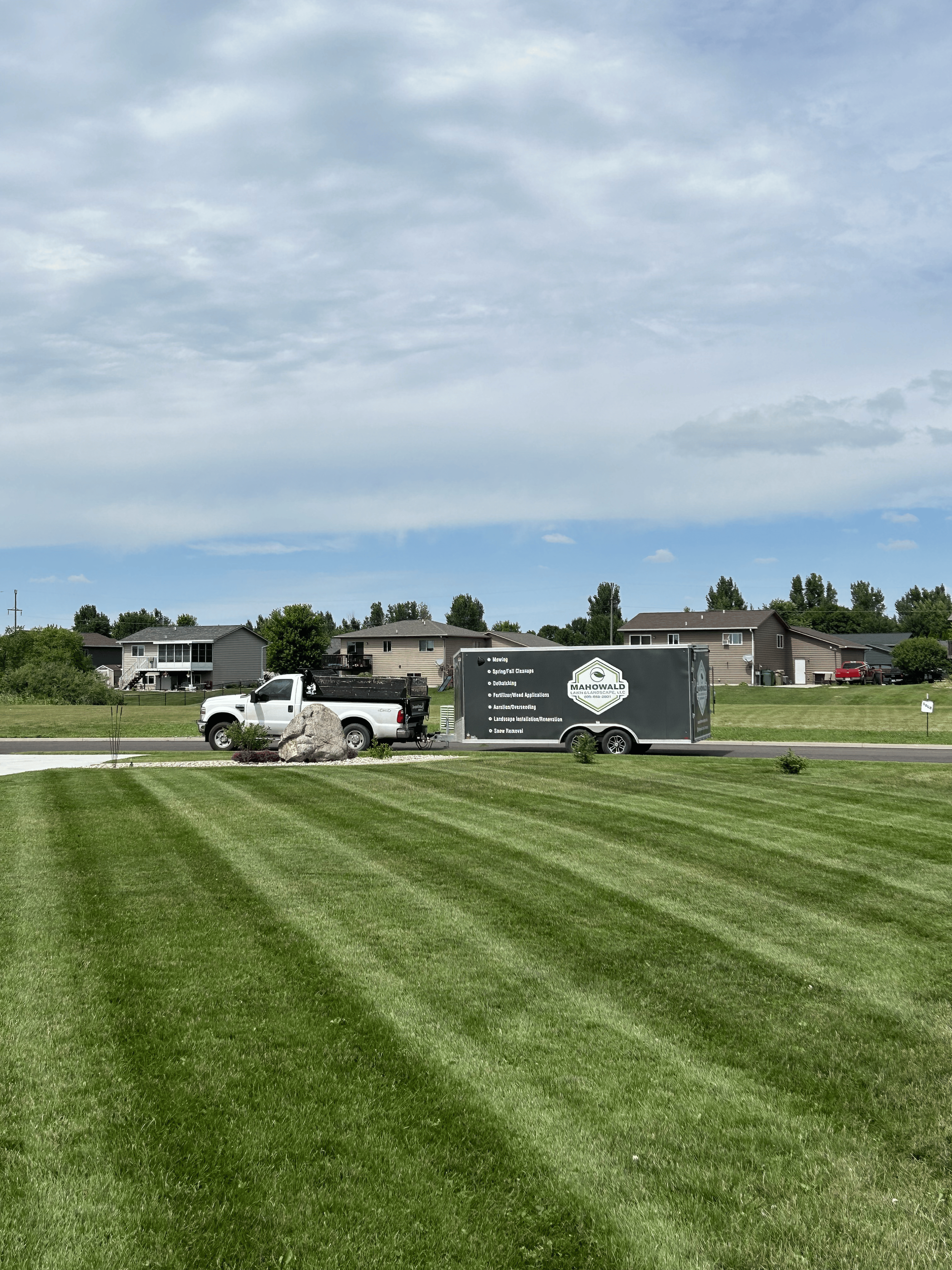 Weekly lawn mowing service in Watertown SD including trimming edging and cleanup