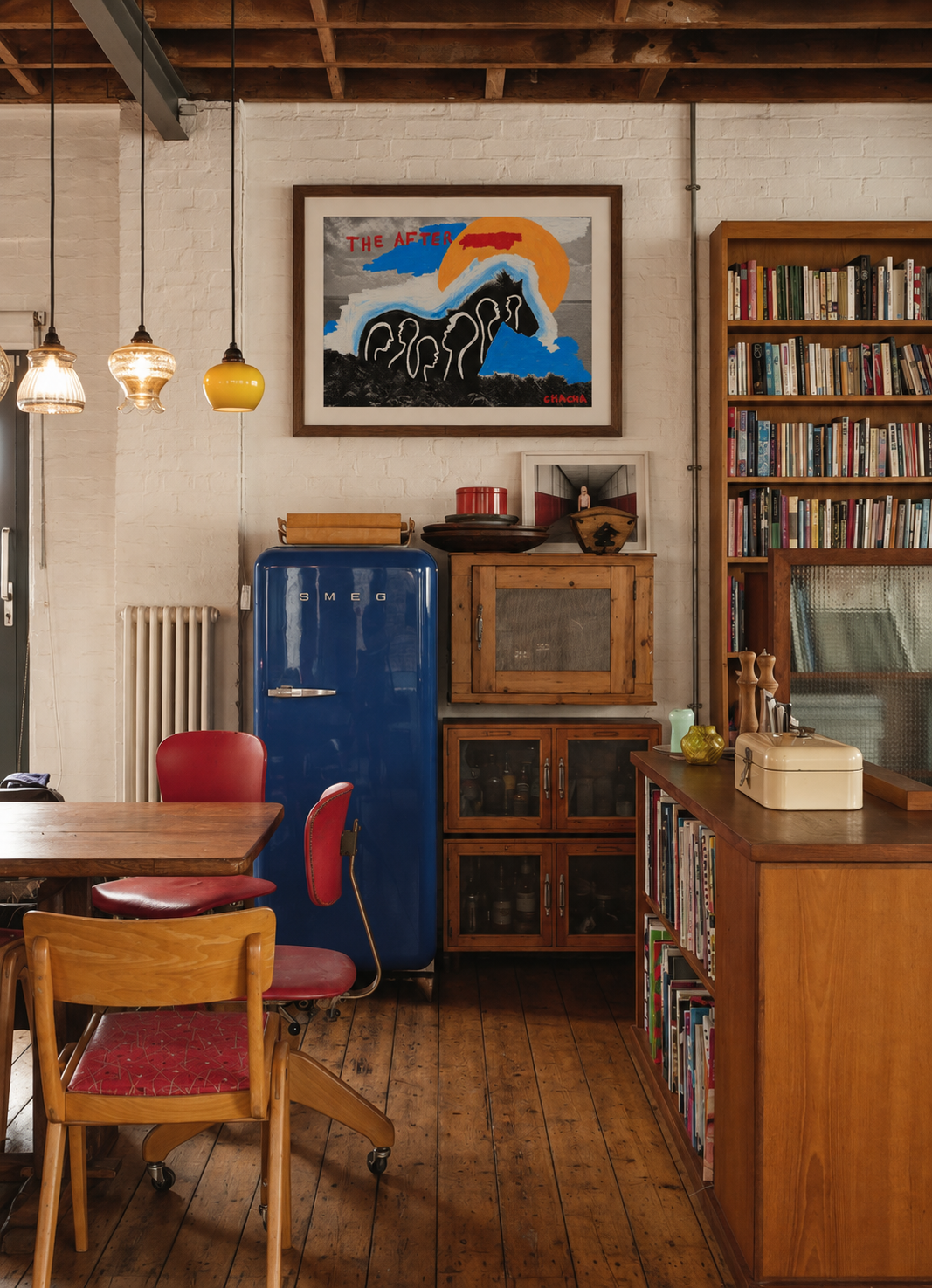 Warm Loft Kitchen with Bold Artwork.png