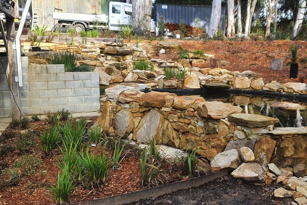 Natural stonework design enhances modern build