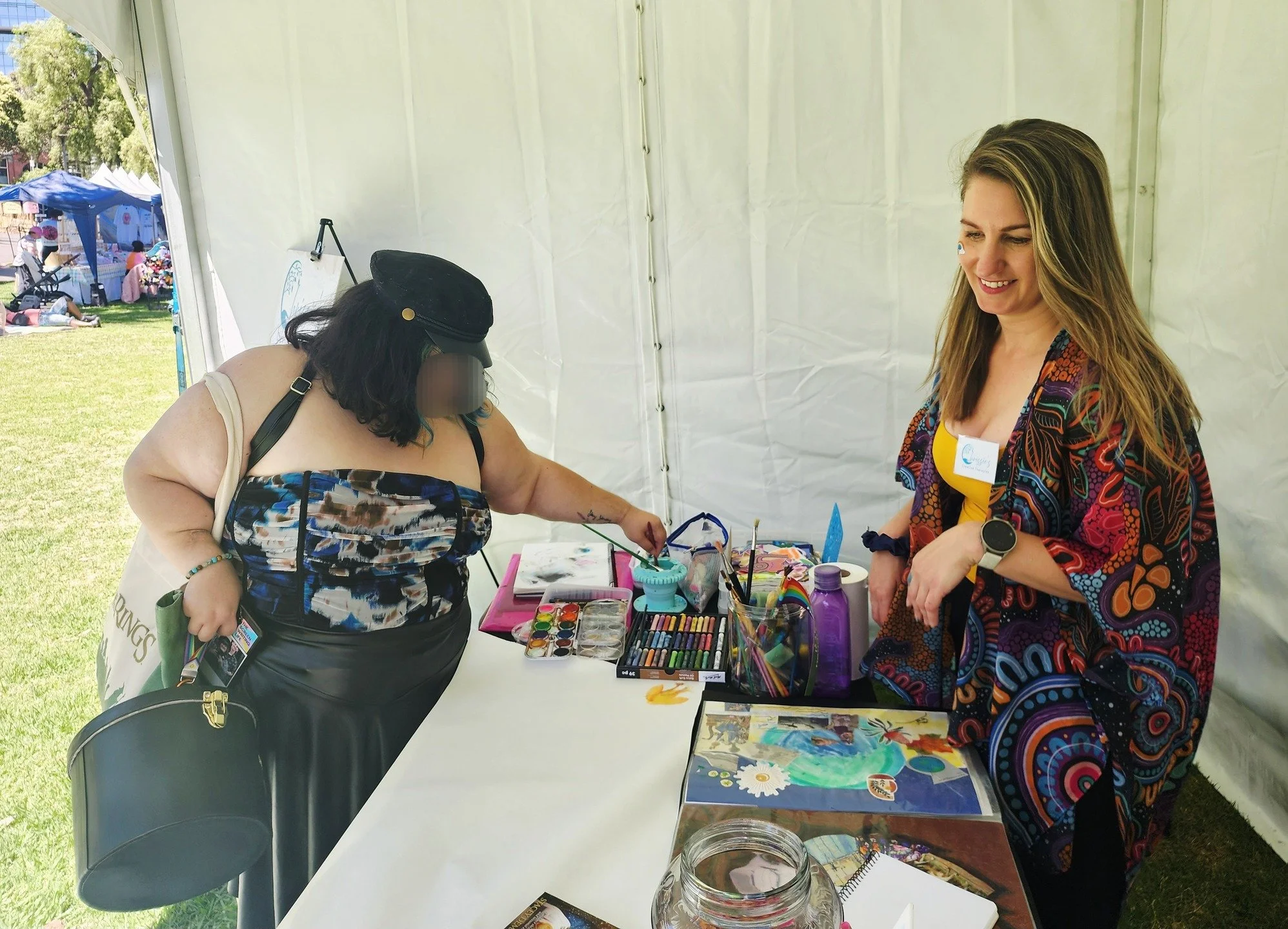 Chrissie's Creative Therapies, expo Arts Therapy stand at Midsumma Festival, Geelong - Rainbow Inc. 

Project Theme inviting festival attendees to express the below question using arts materials:

"What does the Rainbow Community mean to you?&qu