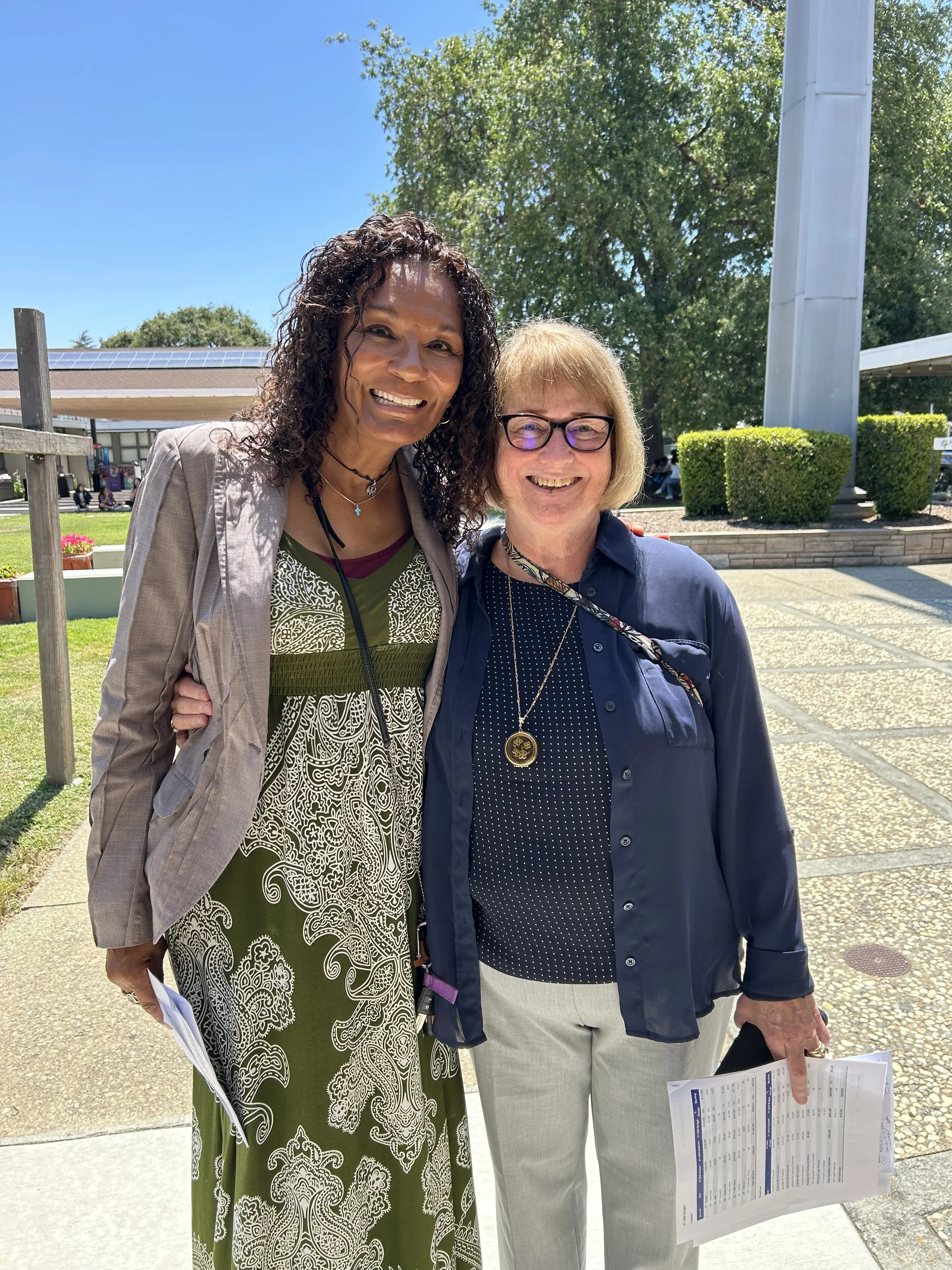 Two women smiling on Sunday before worship service at First Presbyterian Church of Mountain View