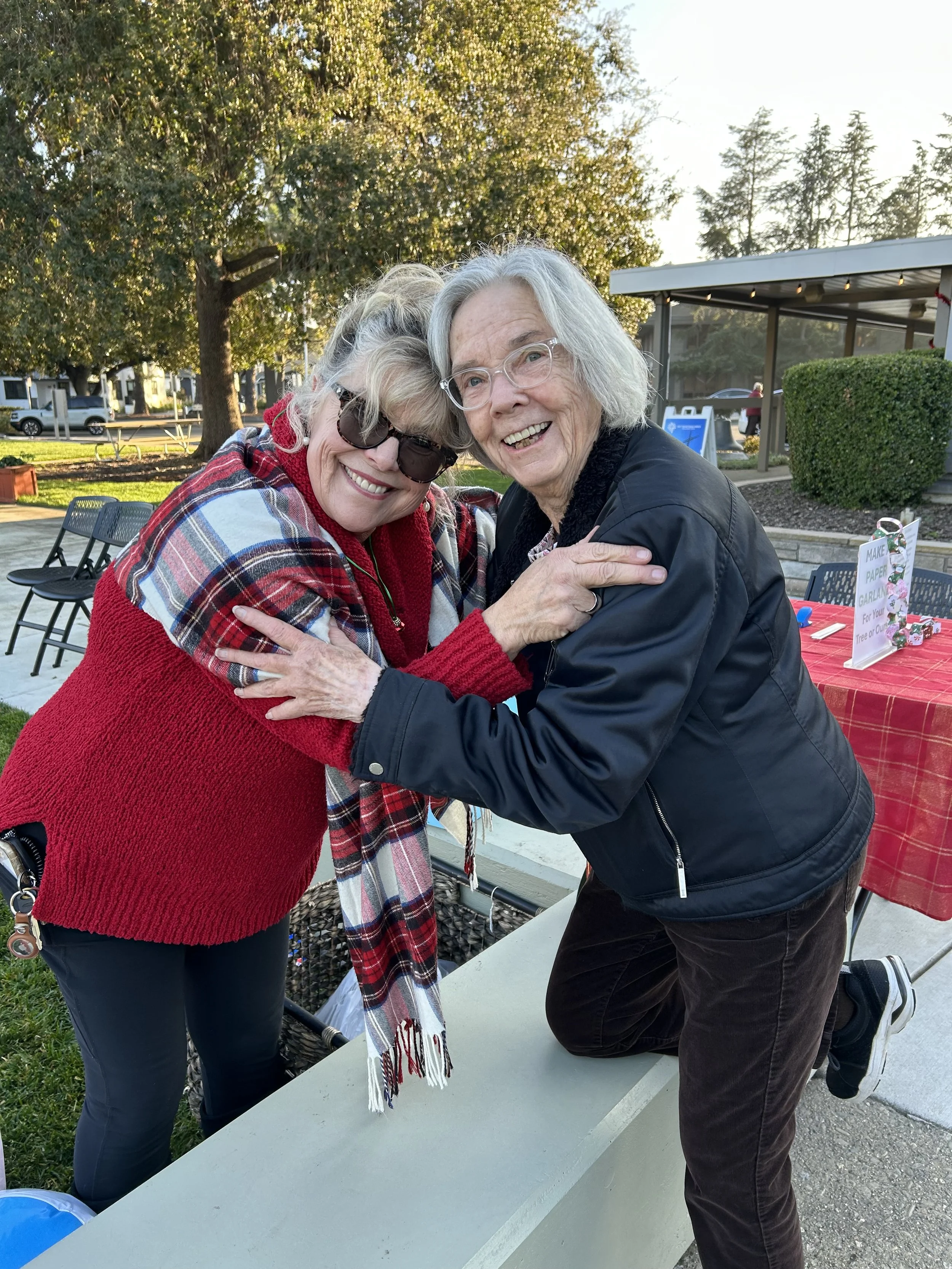 Smiling Church volunteers setting up for an event at First Presbyterian Church Mountain View